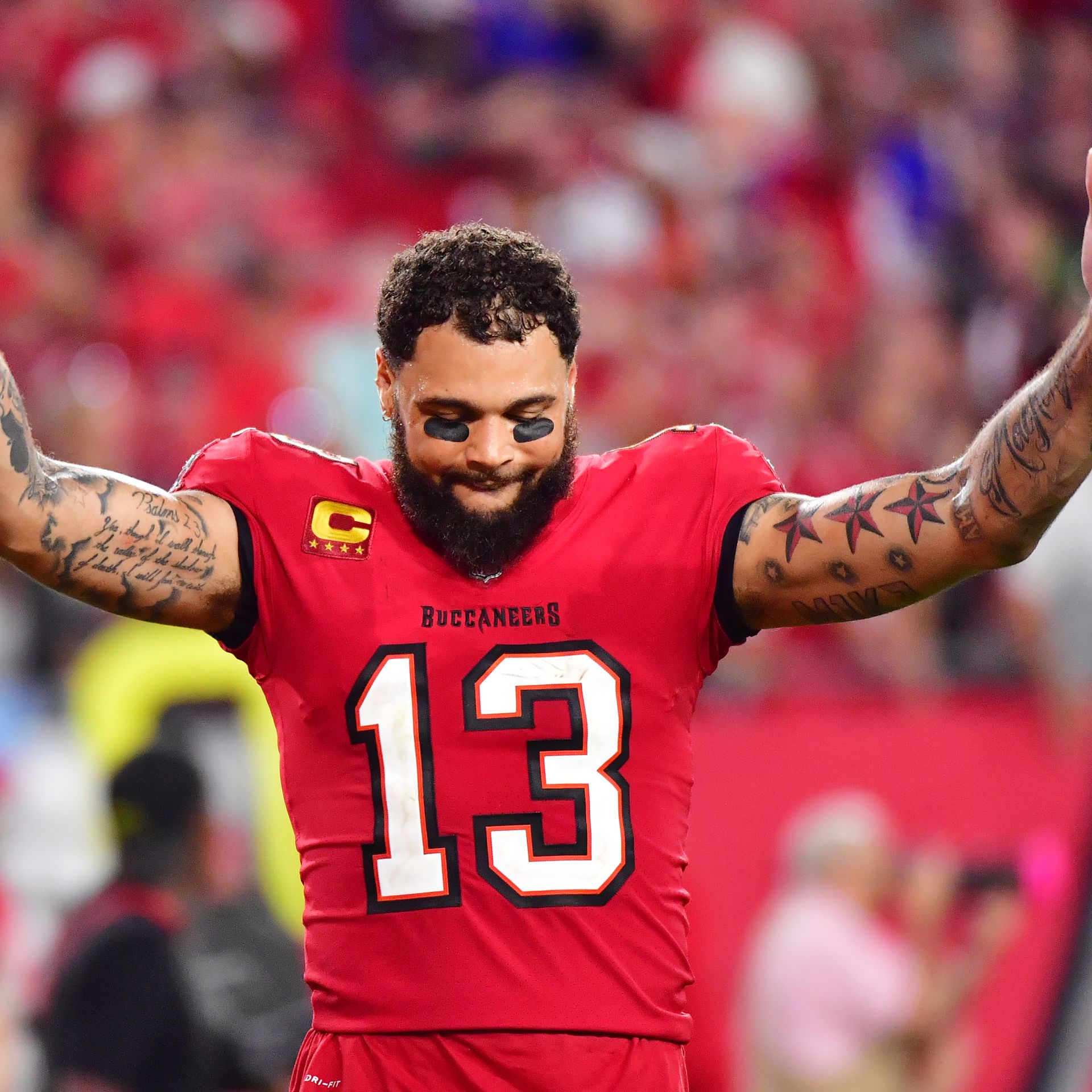 Mike Evans #13 celebrates after the Tampa Bay Buccaneers defeated the Buffalo Bills 33-27 in overtime at Raymond James Stadium on December 12, 2021 in Tampa, Florida. 