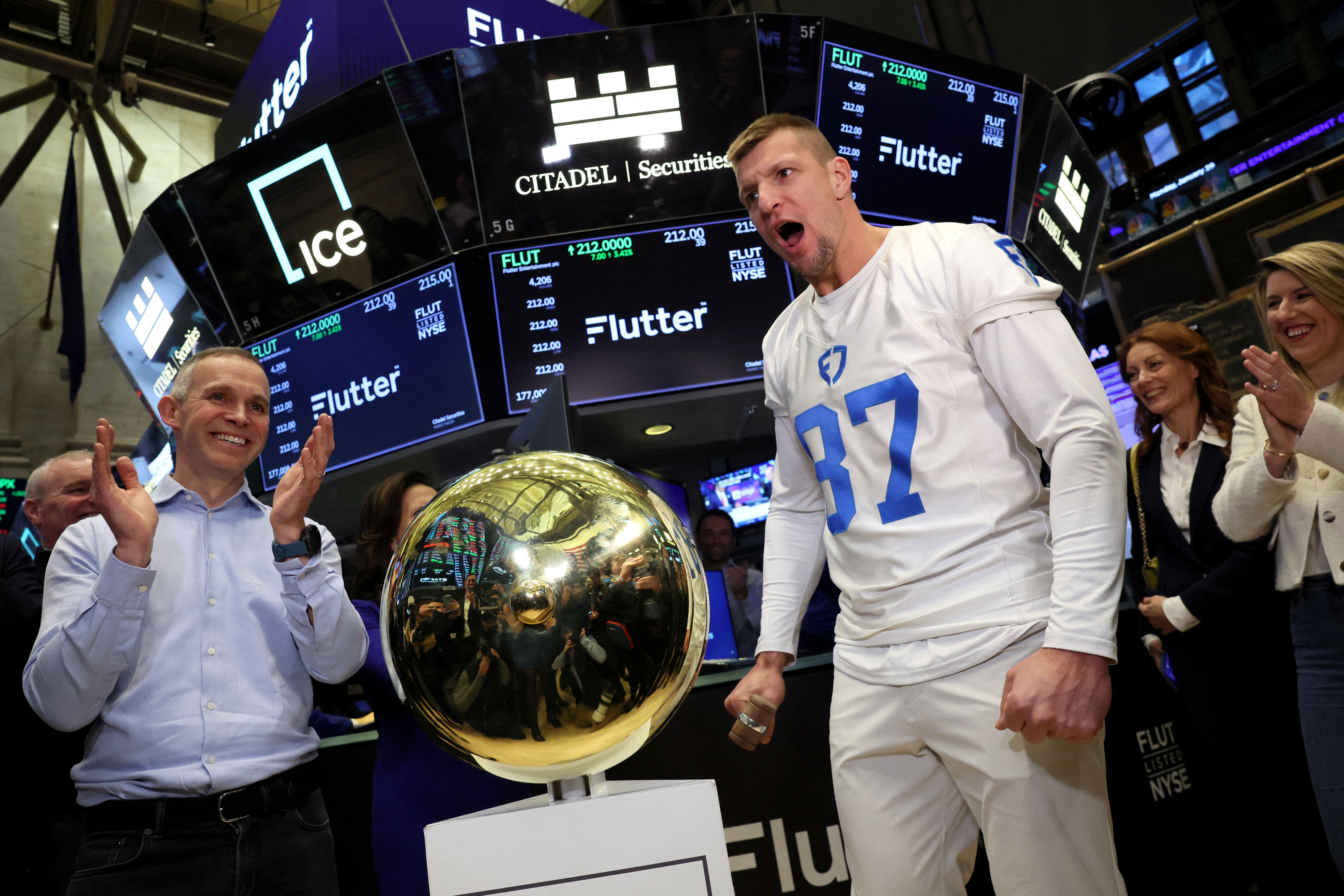 Peter Jackson, CEO of Flutter Entertainment, and Rob Gronkowski attend the FanDuel parent company's listing at the New York Stock Exchange (NYSE) in New York City, U.S., January 29, 2024. REUTERS/Brendan McDermid
