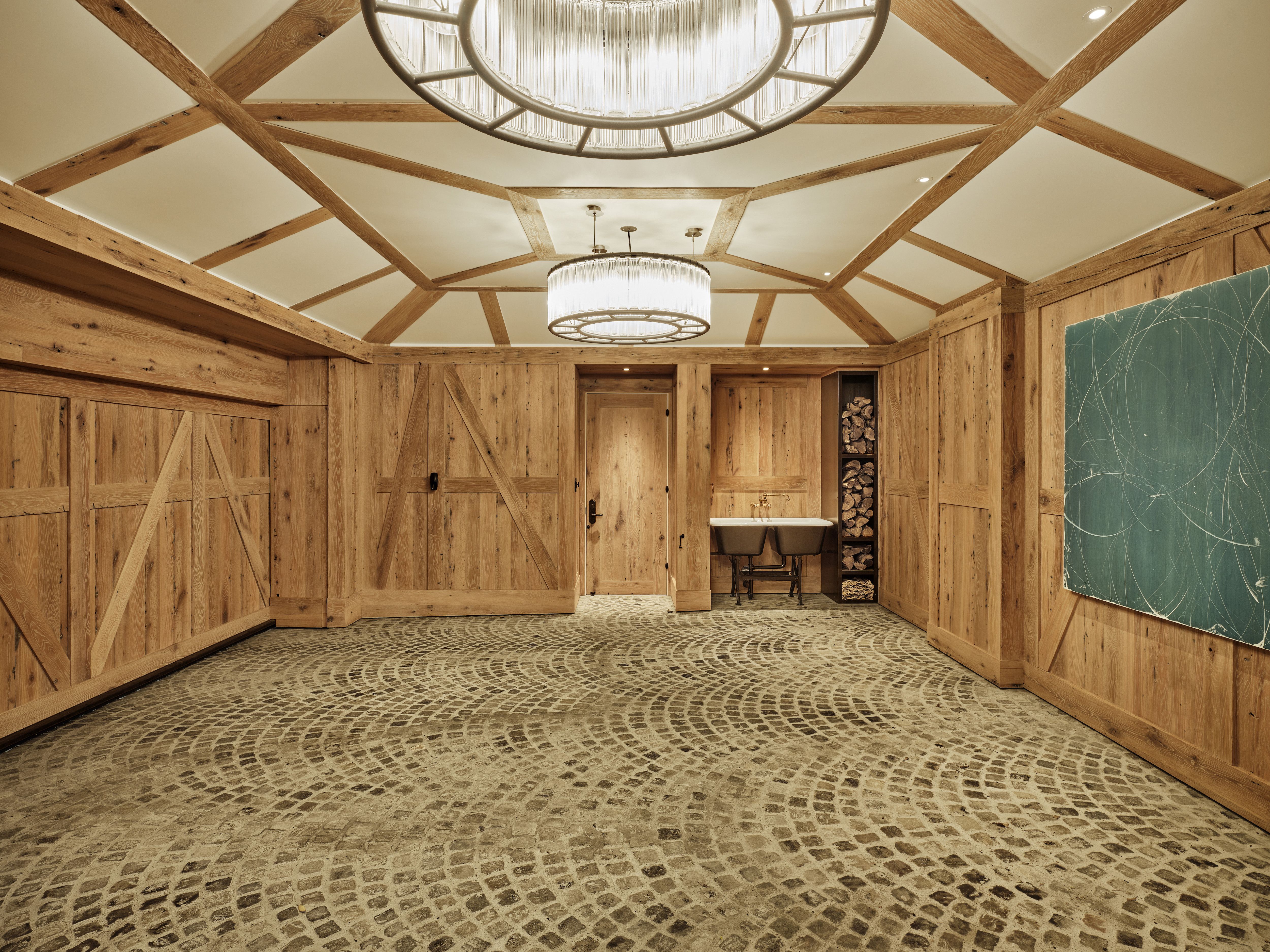 Interior room with wood paneling. 