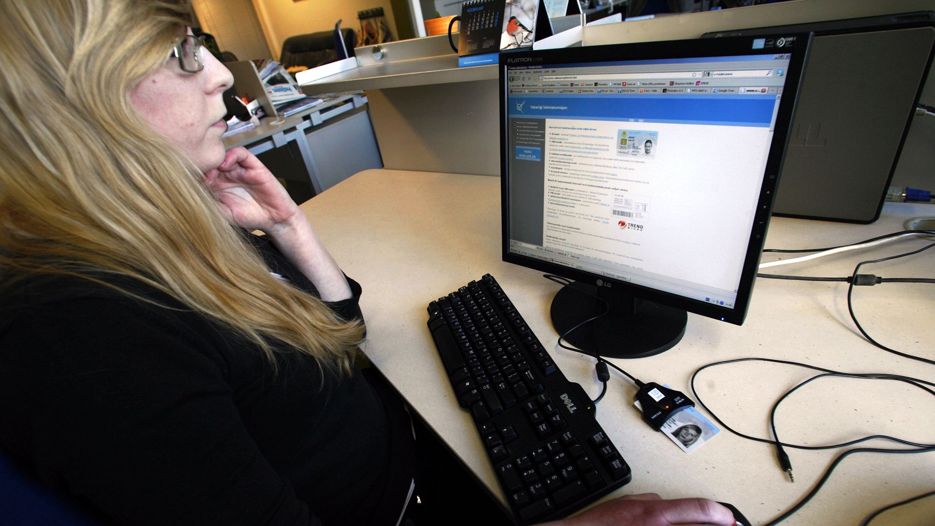Photo of a woman at a computer