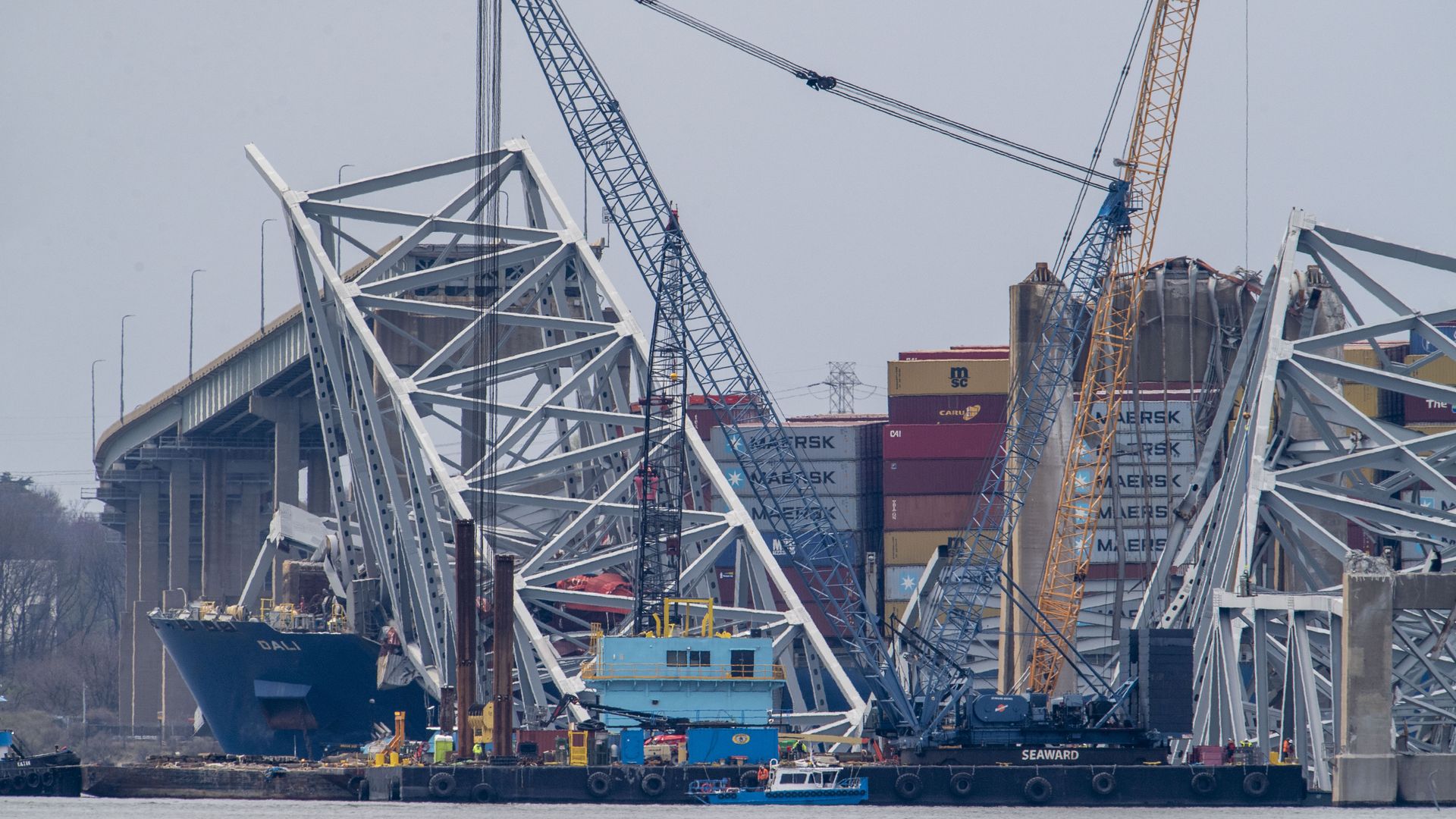 A crane at the Key Bridge collapse site