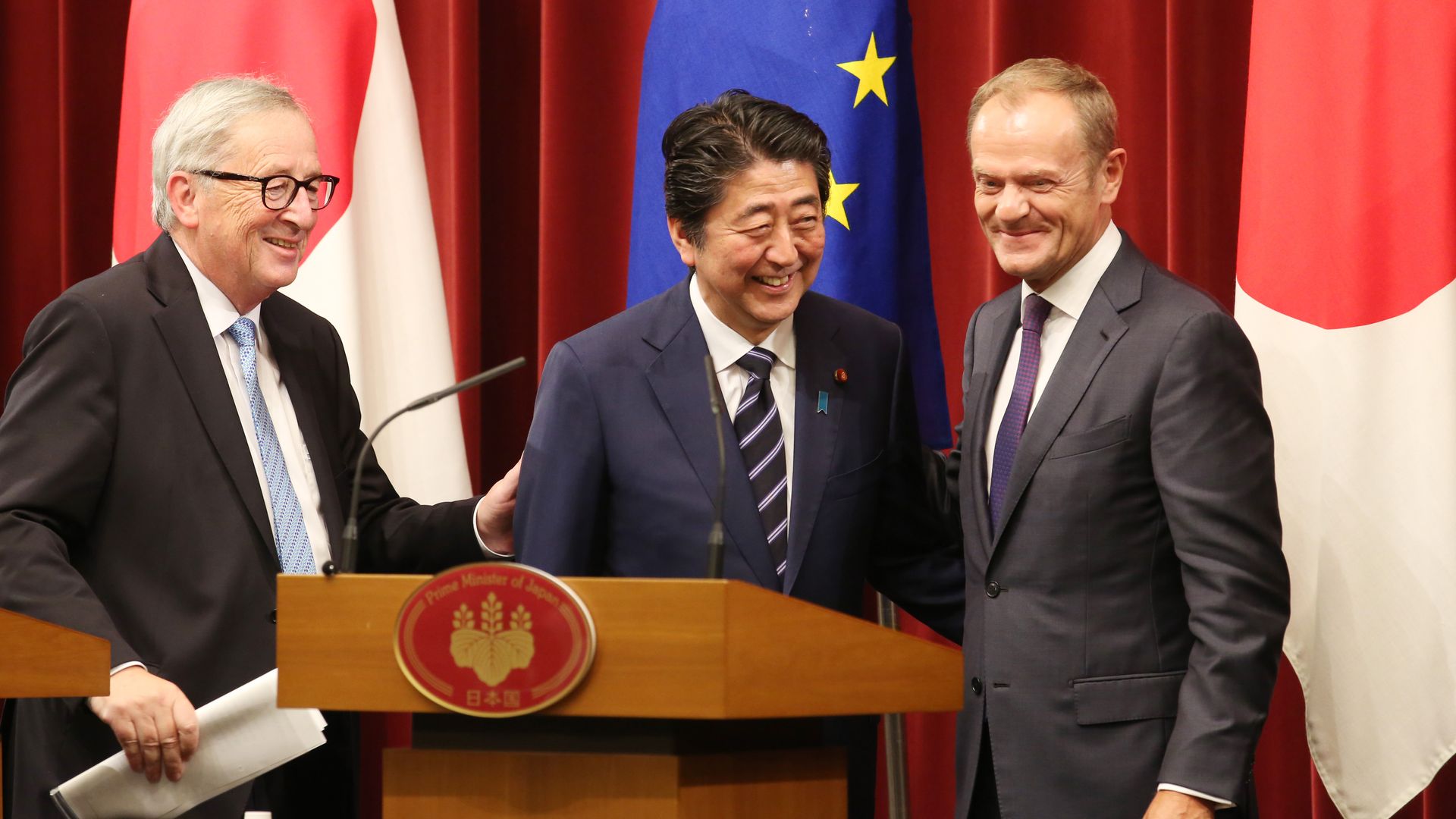 Japanese Prime Minister Shinzo Abe, European Commission President Jean-Claude Juncker and European Council President Donald Tusk at a joint press conference on the trade deal.