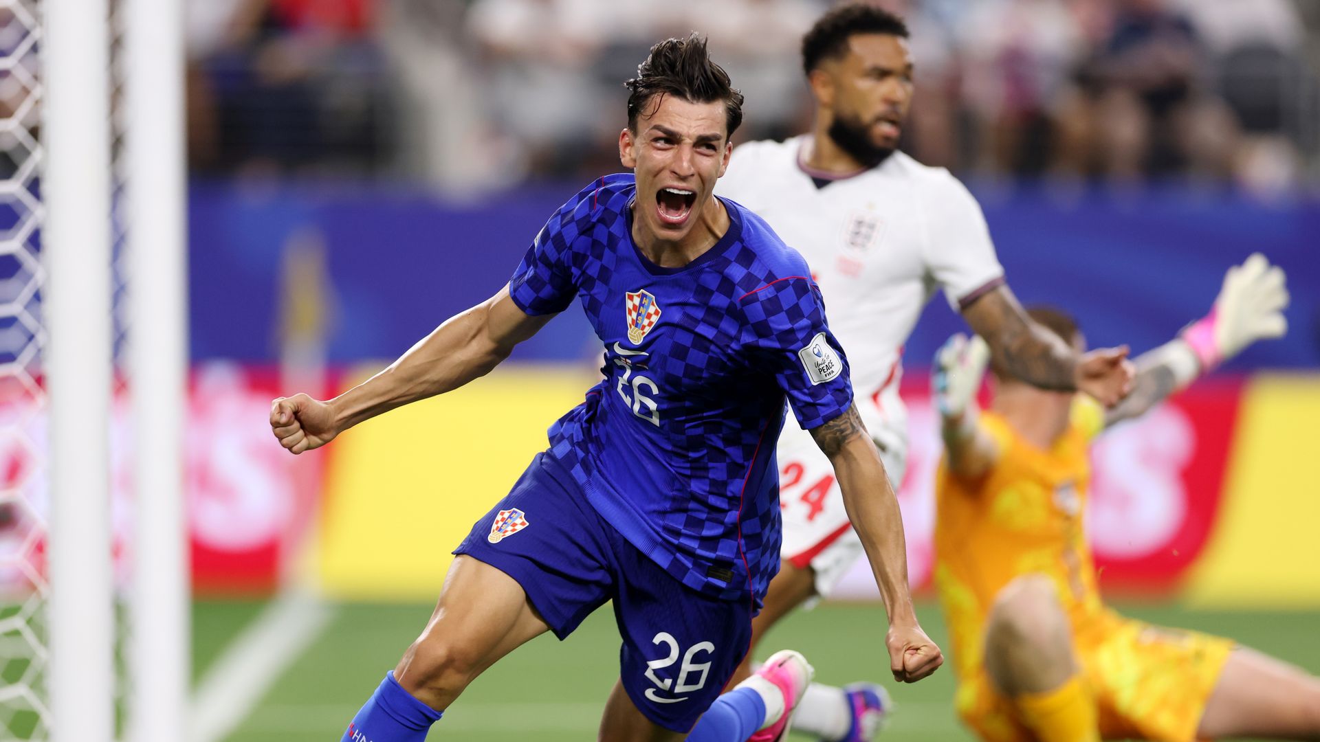 Petar Musa celebrates on the field