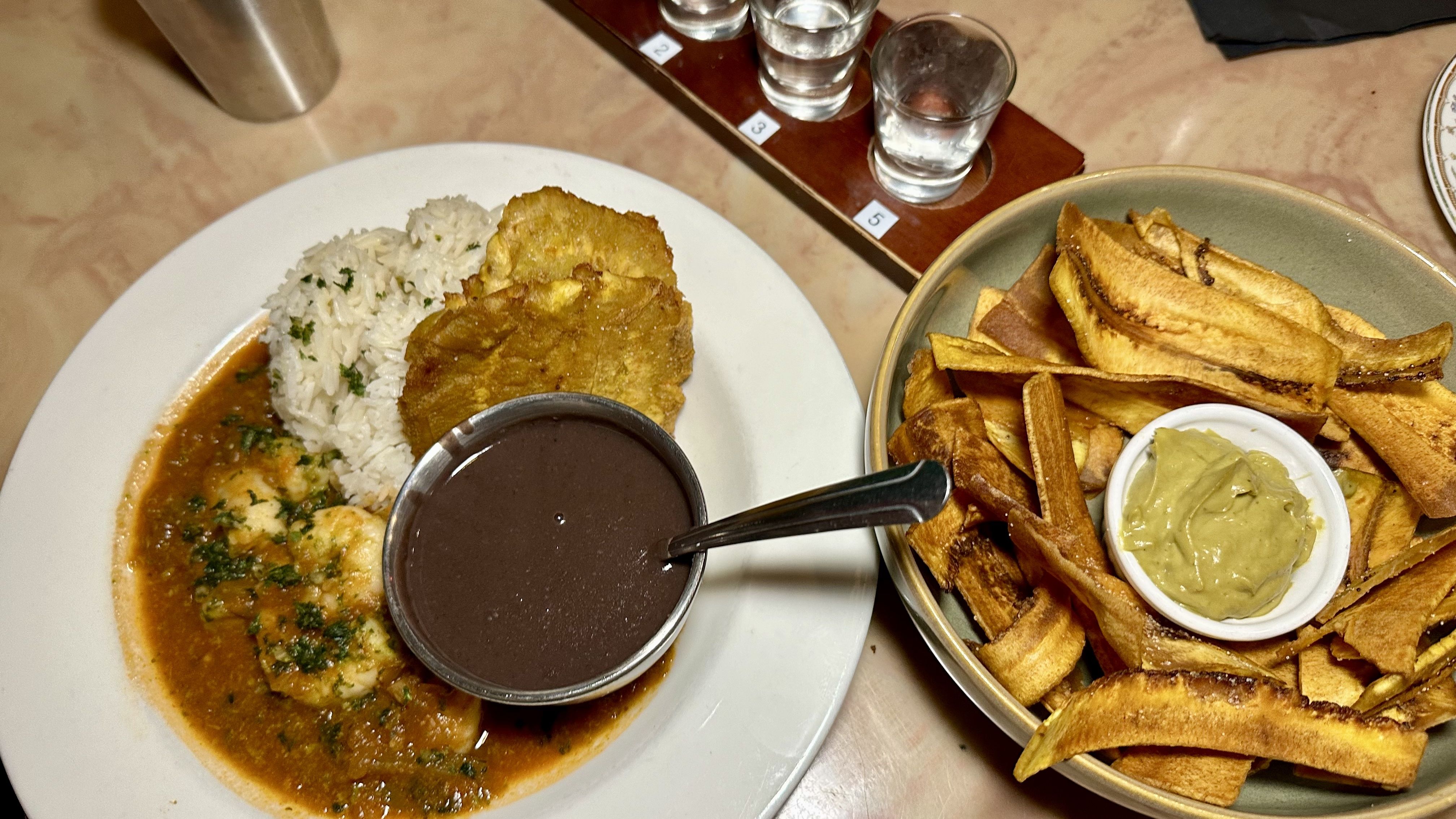 Image shows plates of food at Fritai.