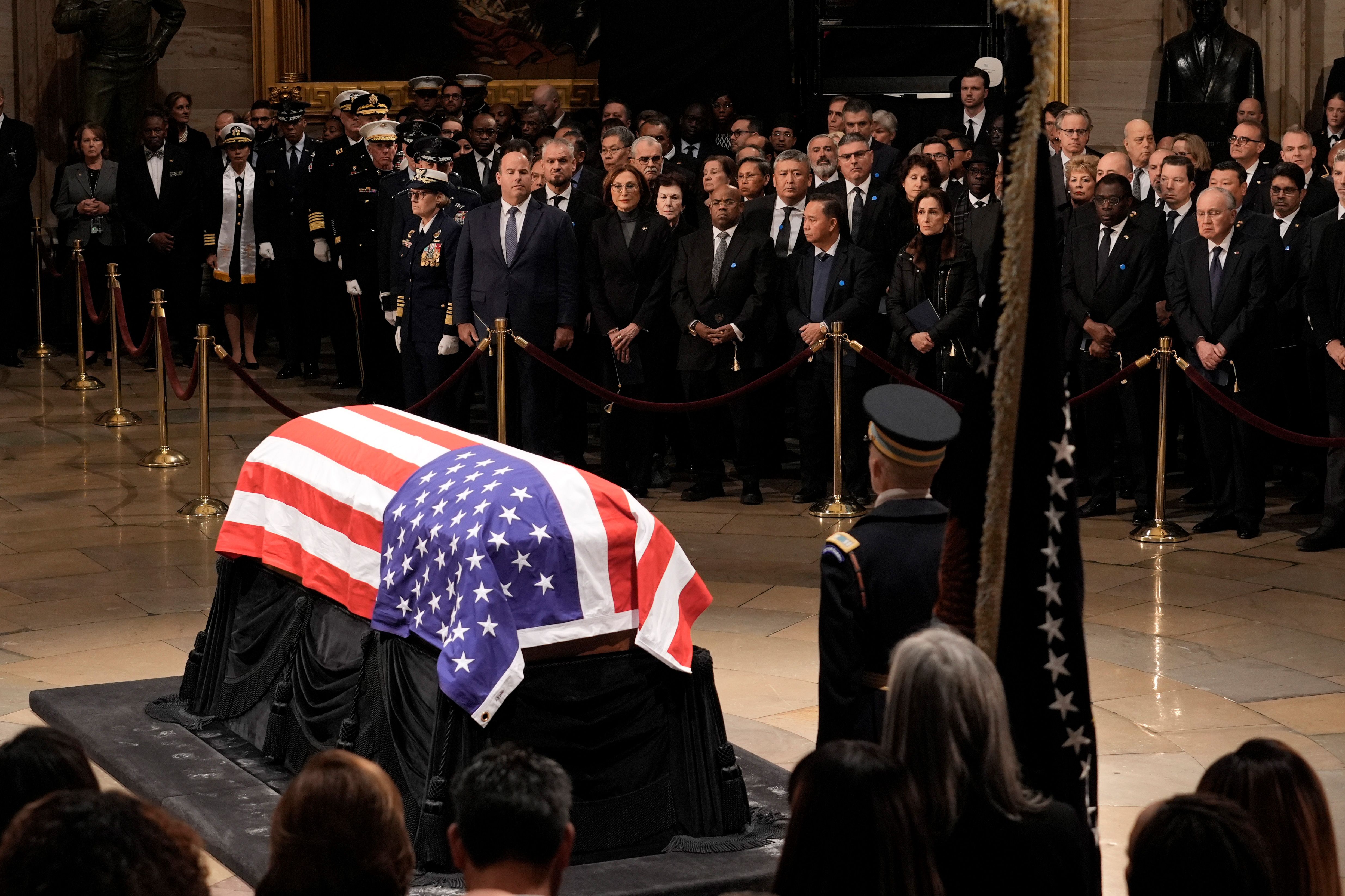 Guests attend a ceremony for the late former US President Jimmy Carter in the Rotunda of the US Capitol in Washington, DC, US, on Tuesday, Jan. 7, 2025. Carter, the former Georgia peanut farmer who as president brokered a historic and lasting peace accord between Israel and Egypt in a single term ma