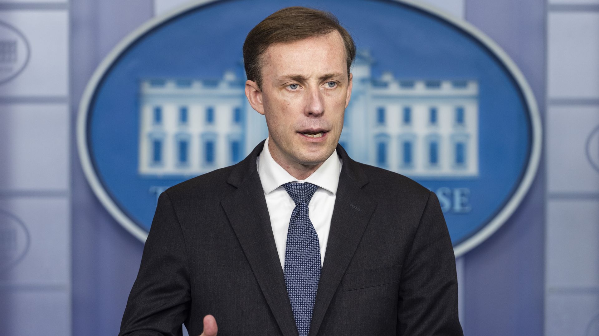 National security adviser Jake Sullivan is seen speaking at the White House.