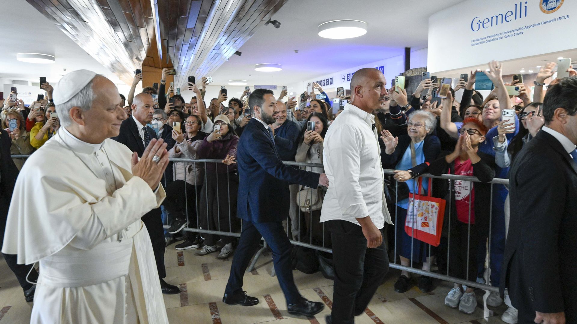 Pope Leo XIV greets faithful as he arrives at Gemelli Hospital on October 13, 2026 in Rome, Italy.