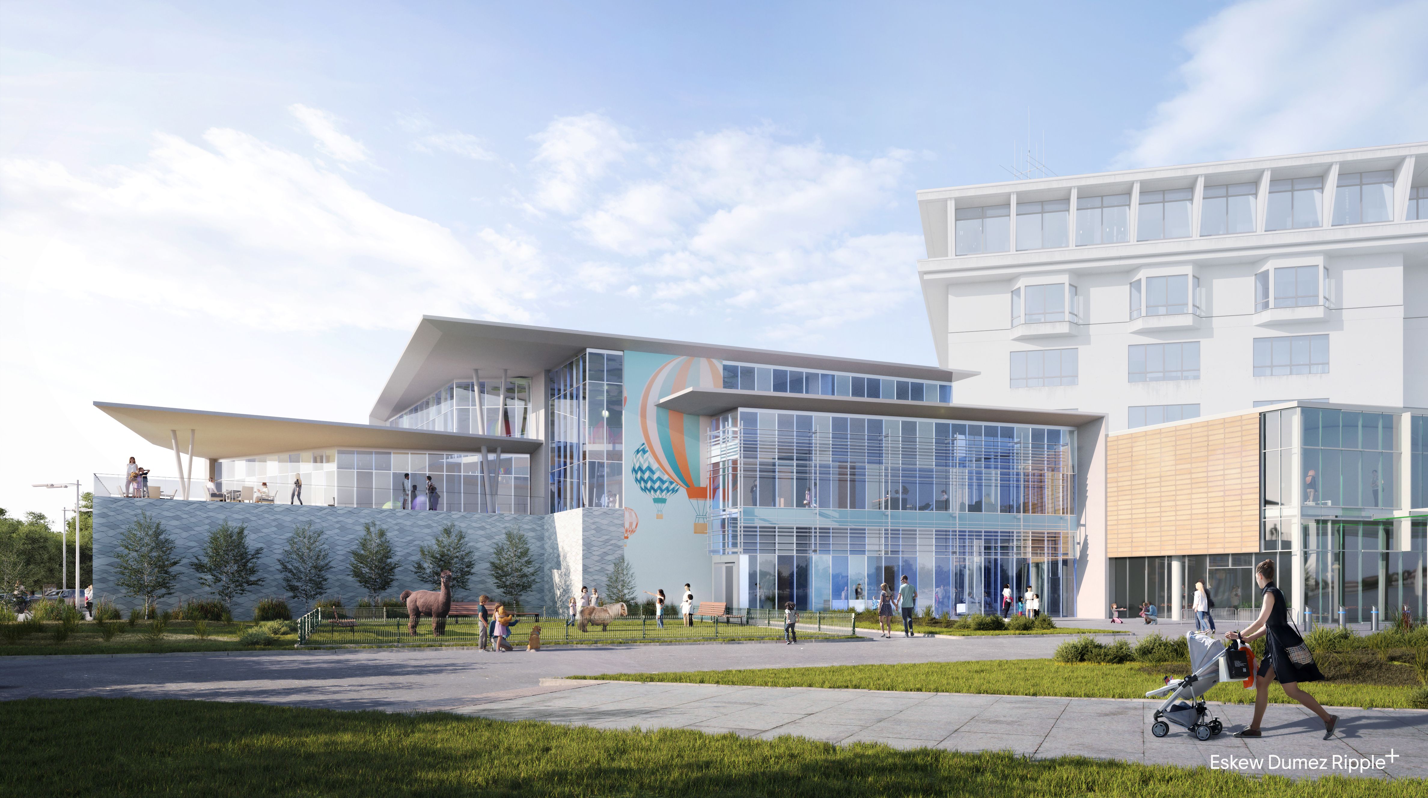 A rendering of Walker's Imaginarium, viewed from the outside. The building is a modern glass design with a large mural of a hot air balloon.