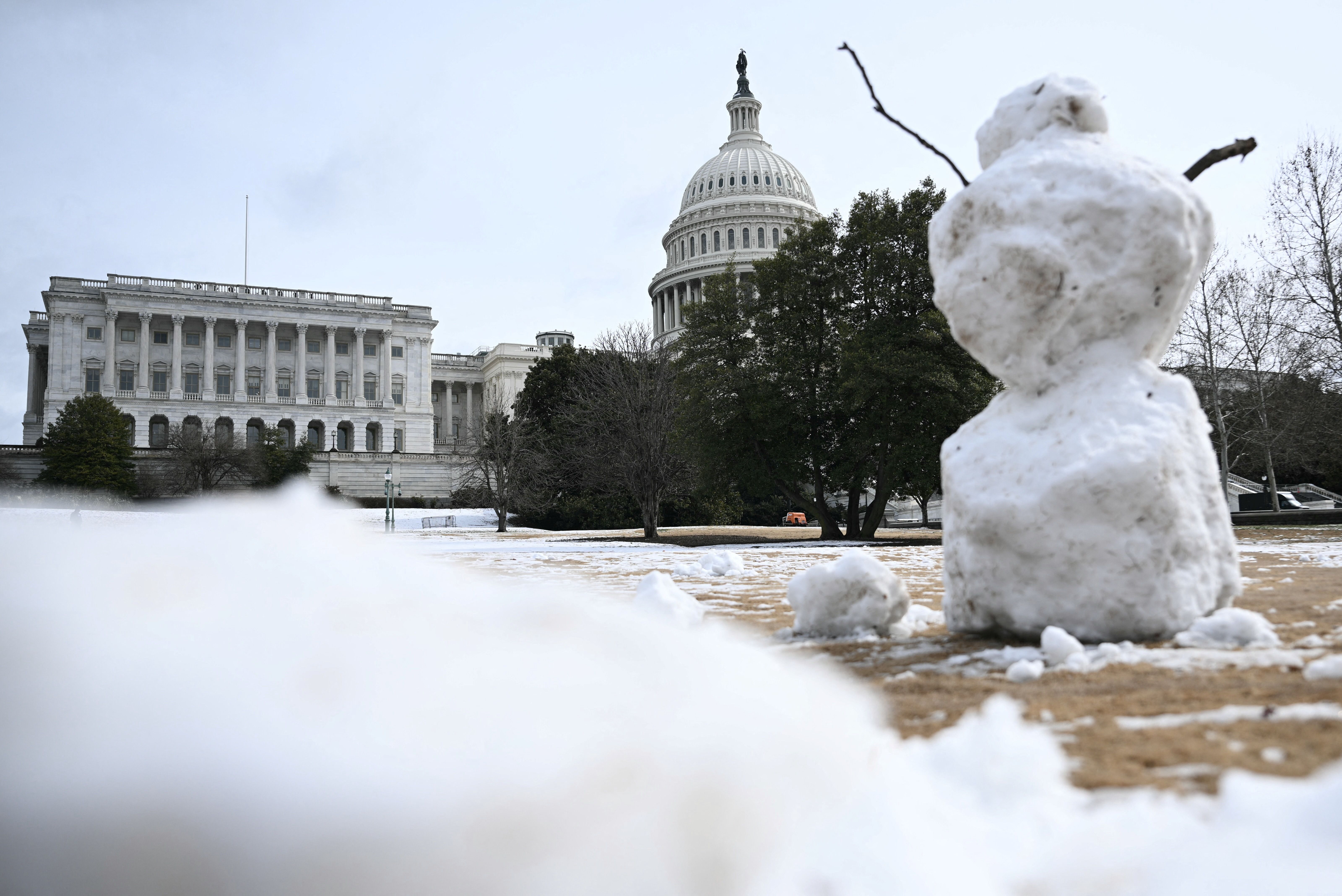 A snowman near the U.S. Capitol yesterday. Photo: Brendan Smialowski/AFP via Getty Images