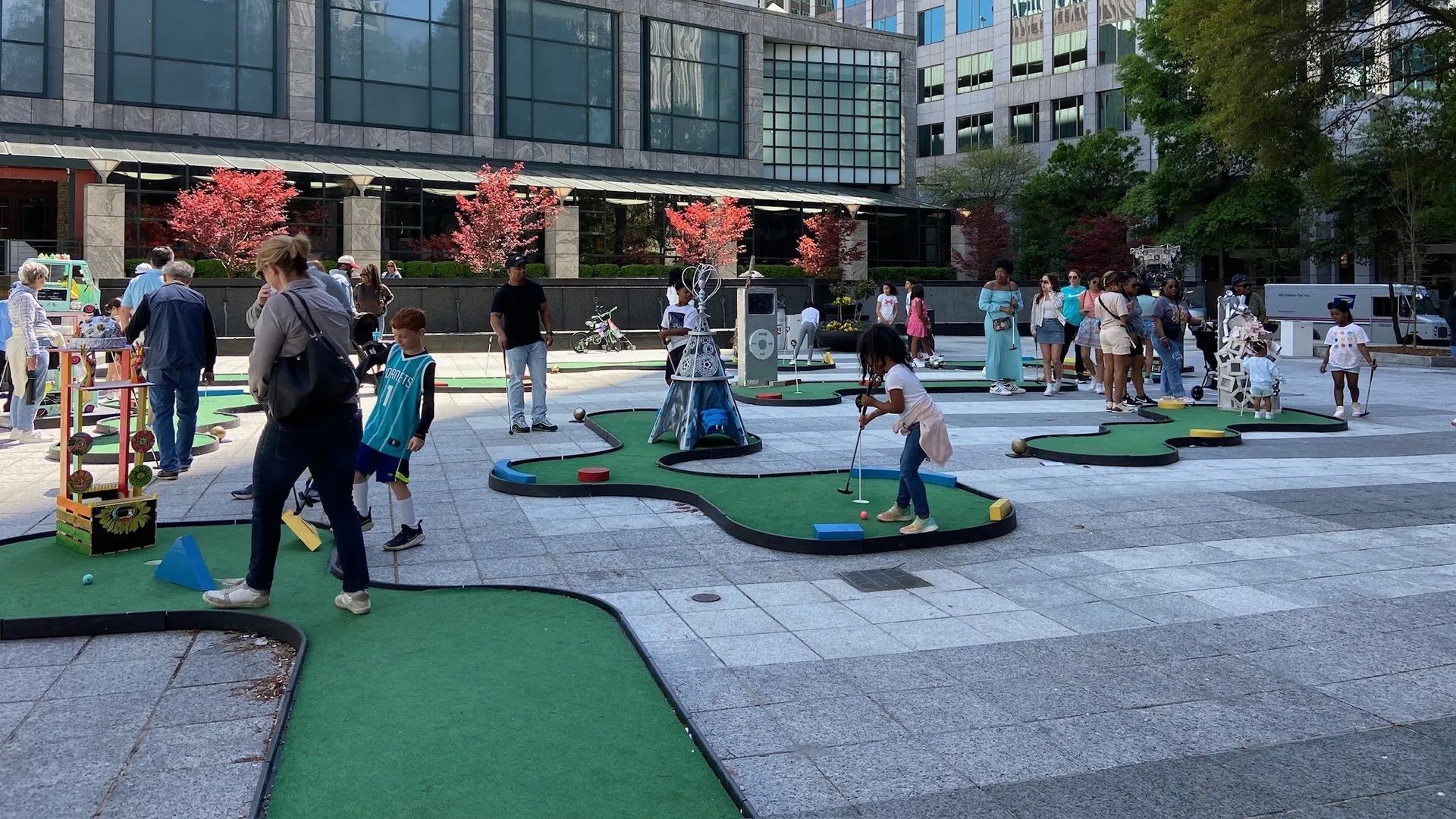 The popular arts festival Charlotte SHOUT! brought back the popular put-put game to Uptown. Photo: Ashley Mahoney/Axios 