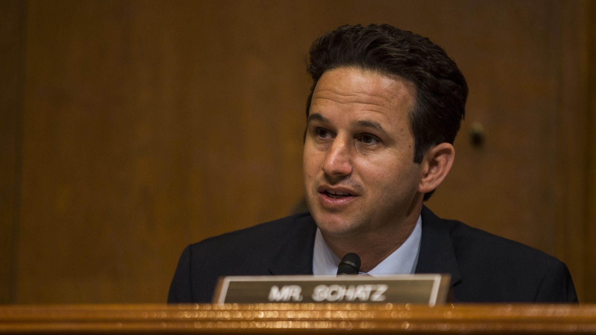 Sen. Brian Schatz speaks at a hearing