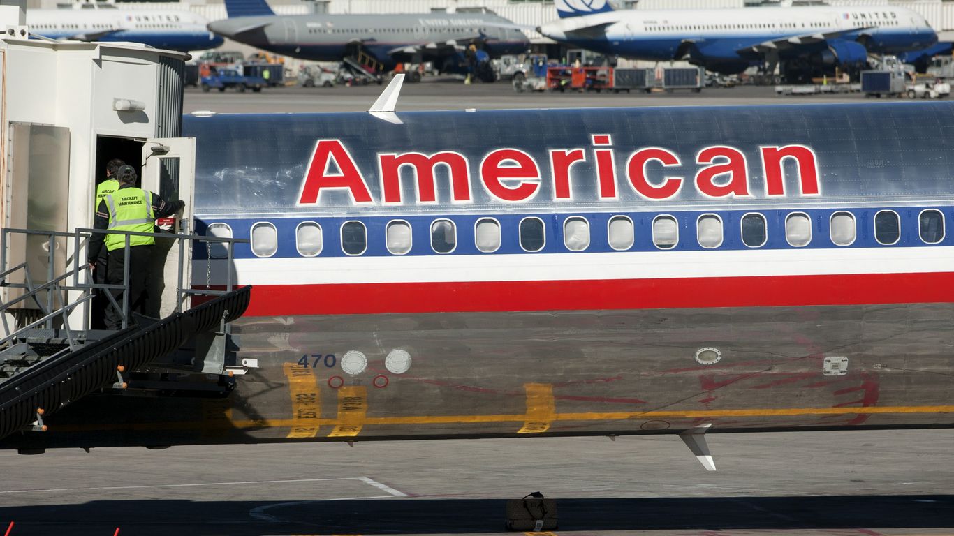 American Airlines passengers evacuate onto wing after jet catches fire