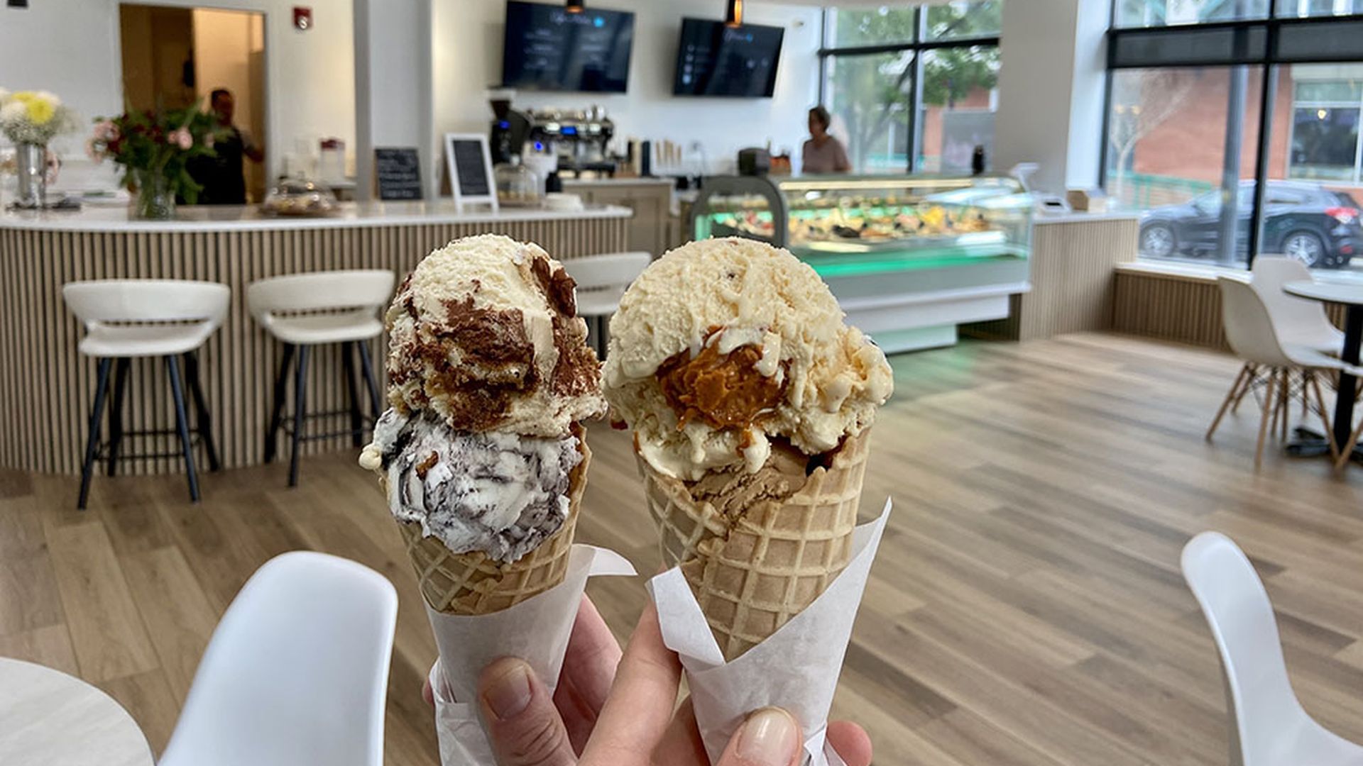 Kookies & caramel and a scoop of coffee in a cone, plus a scoop of Oreo and a scoop of tiramisu in a cone ($13.94 for both). Photo: Ashley Mahoney/Axios