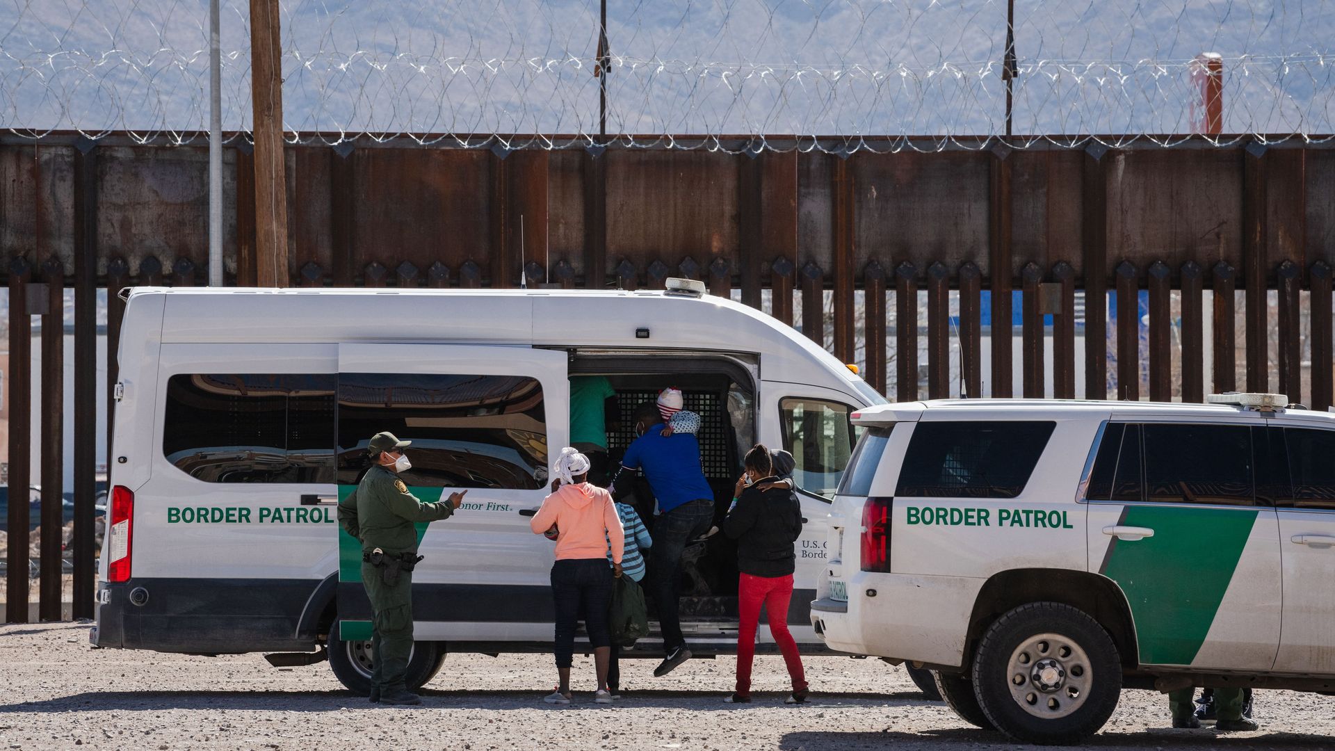 Border Patrol agents apprehending a group of migrants near El Paso, Texas, on March 15.
