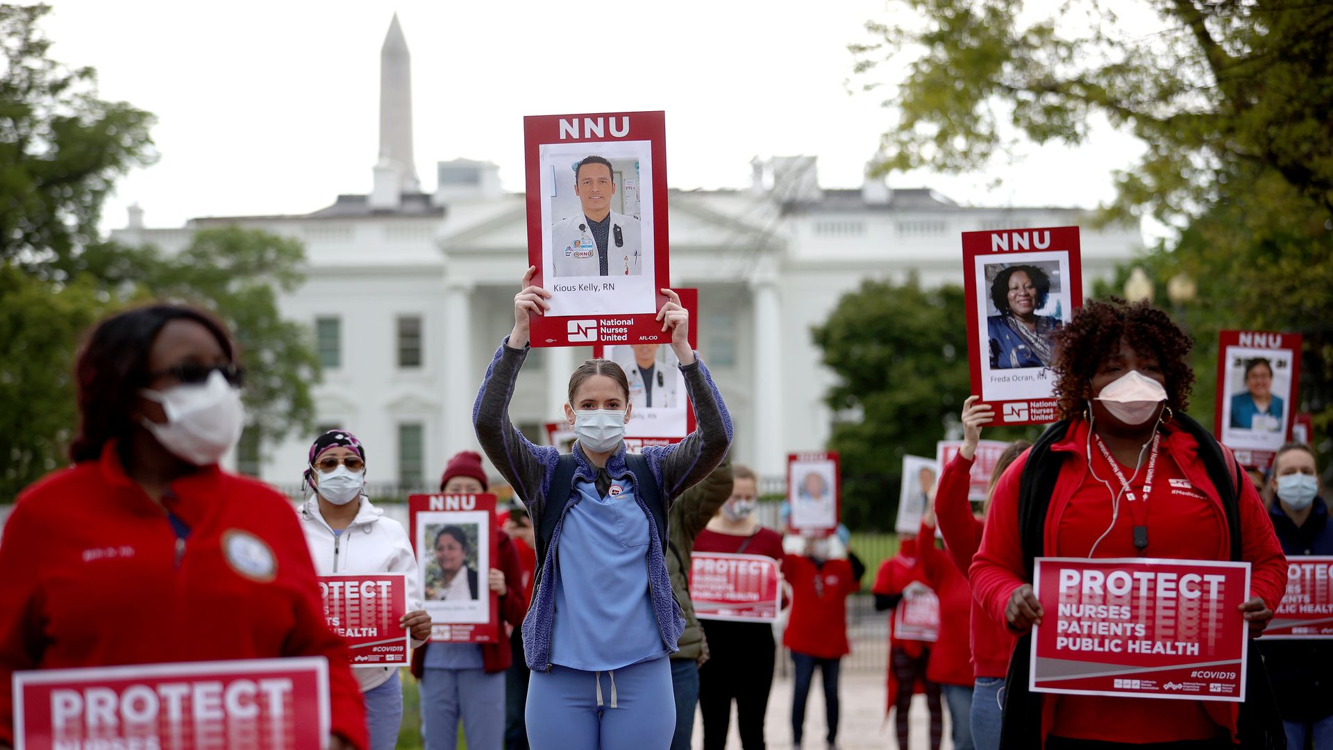 Registered nurses who are members of National Nurses United, the largest nurses union in the United States, protest in front of the White House April 21, 2020 in Washington, DC. 