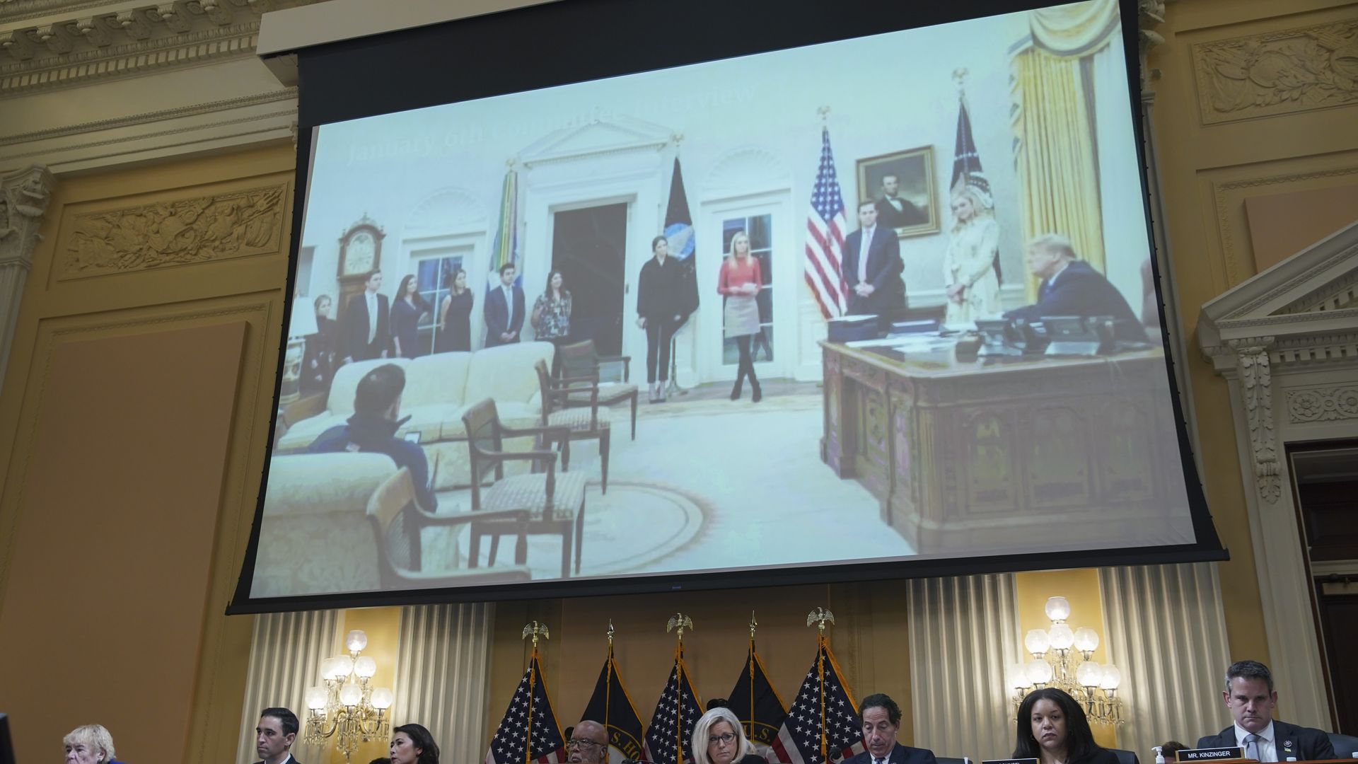 An image of former President Donald Trump, right, displayed on a screen during a hearing of the Select Committee to Investigate the January 6th Attack