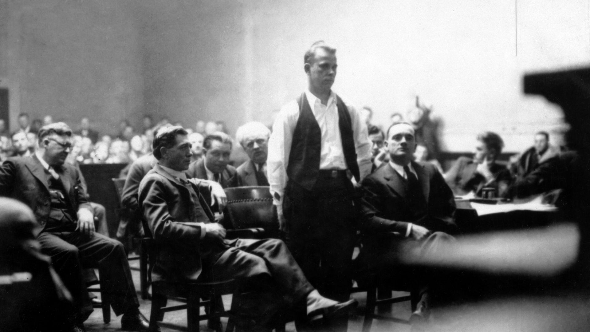 John Dillinger stands in court, Crown Point, Indiana, 1934. 