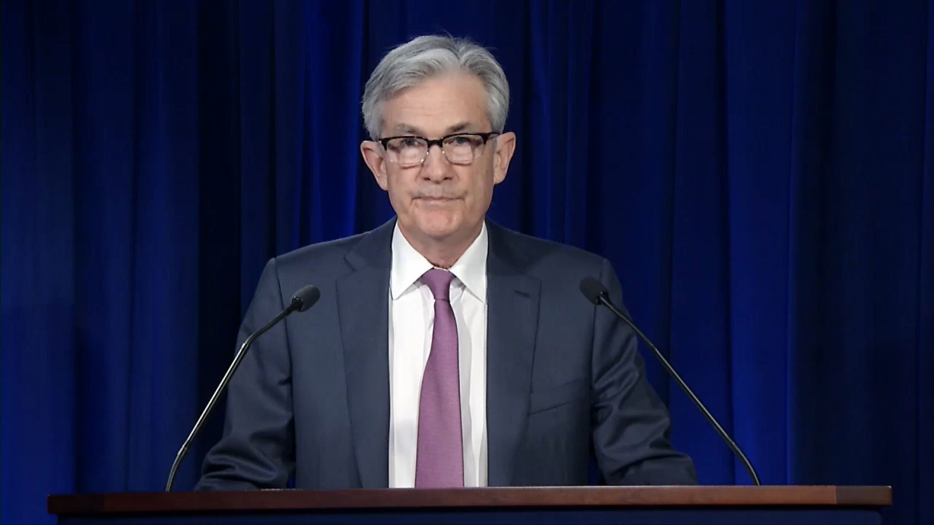 A screen grab of the Federal Reserve chairman giving a virtual statement in April