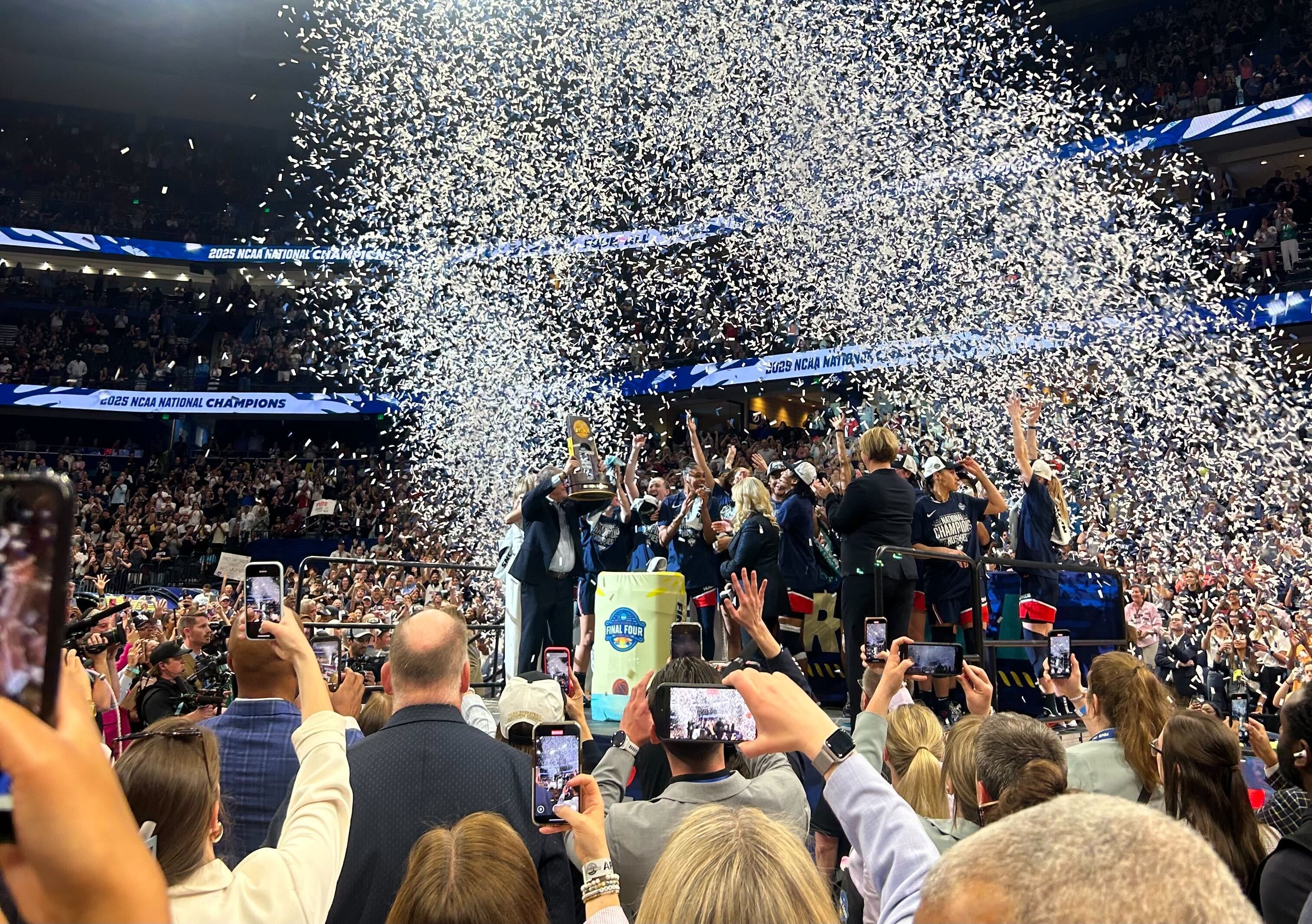 Confetti showers as UConn wins its 12th title after routing South Carolina 82-59.