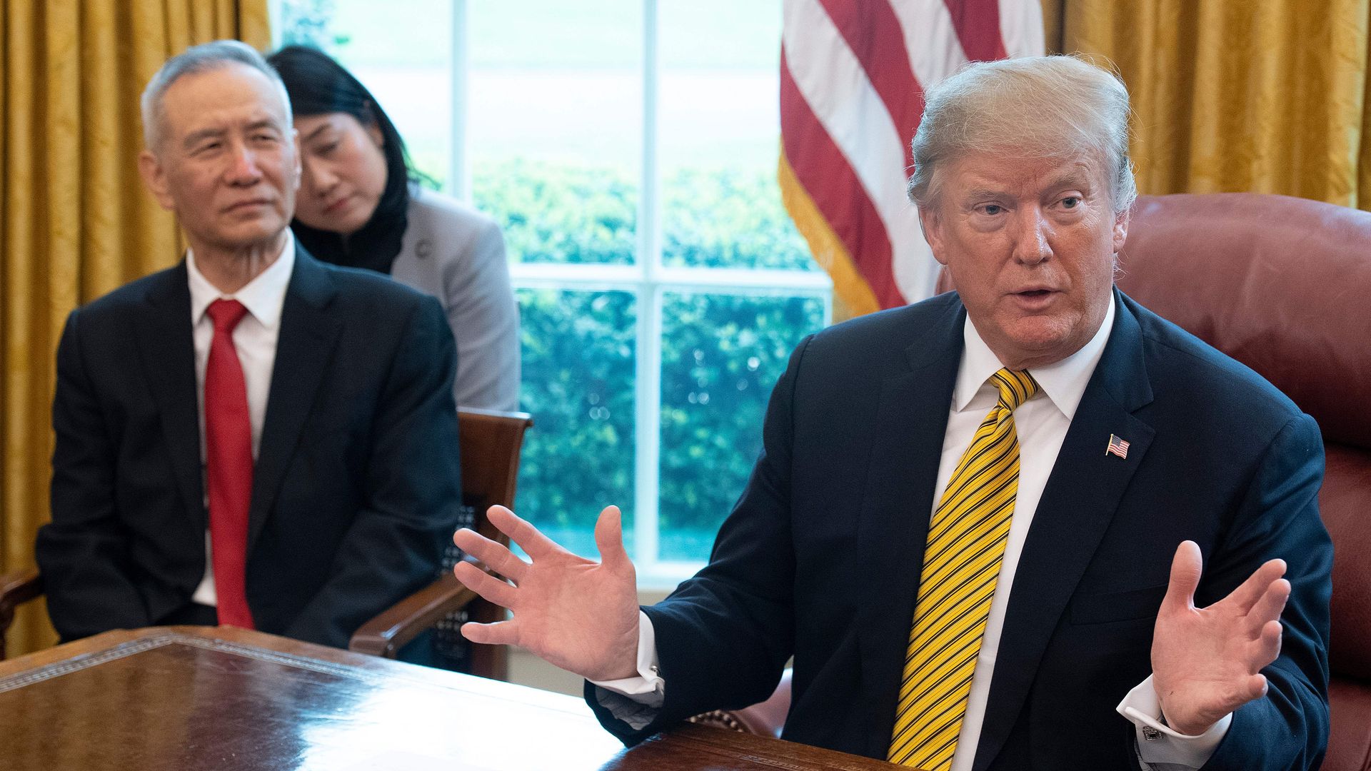 President Trump (R) speaks during a trade meeting with China's Vice Premier Liu He (L) in the Oval Office at the White House in Washington, DC, on April 4.