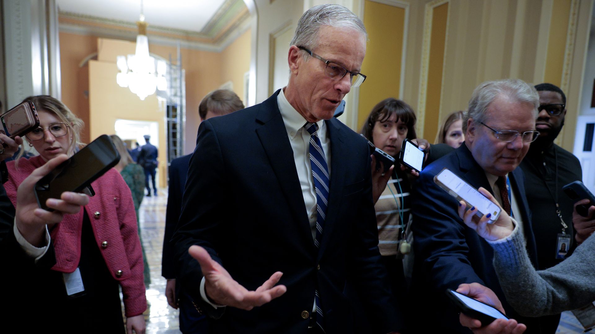 Senate Majority Leader John Thune talks with reporters at the U.S. Capitol on March 12.