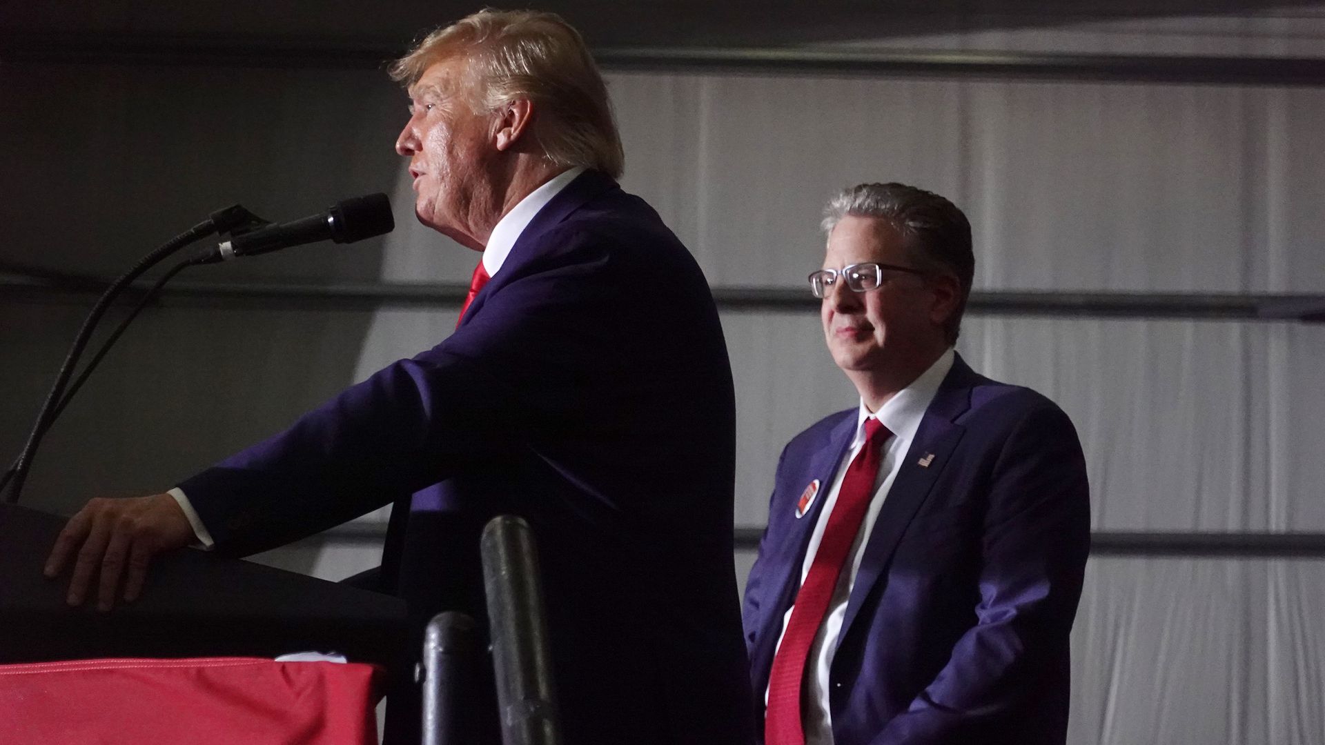 Former President Donald Trump endorses Matthew DePerno (R), the Michigan Republican party's presumptive nominee for state attorney general during an April rally in Michigan. 