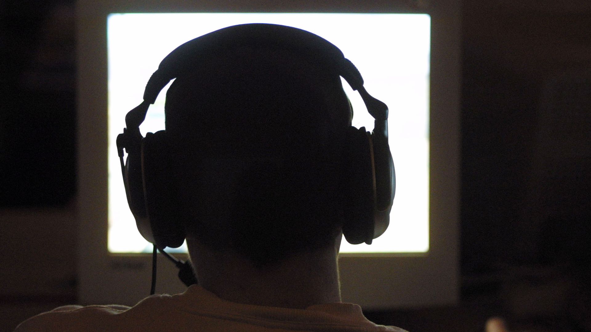 Gamer in front of a TV screen