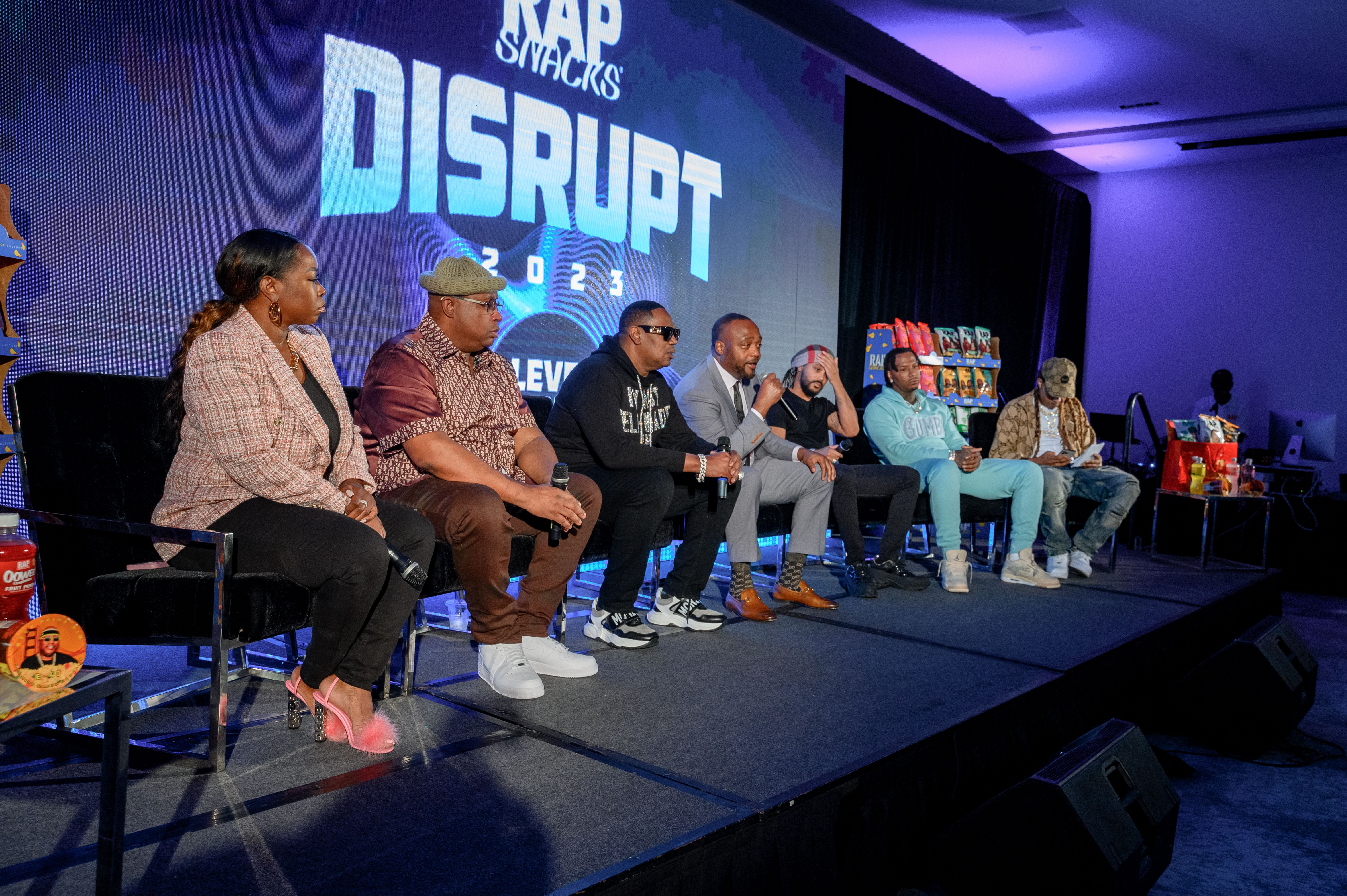 From left: Marilyn Van Alstyne, E-40, Master P, James Lindsay, Romeo Miller, Moneybagg Yo and Big Loon at Rap Snacks’ Disrupt 2023 panel in Fort Lauderdale. (Photo: Ivan Apfel/Getty Images)