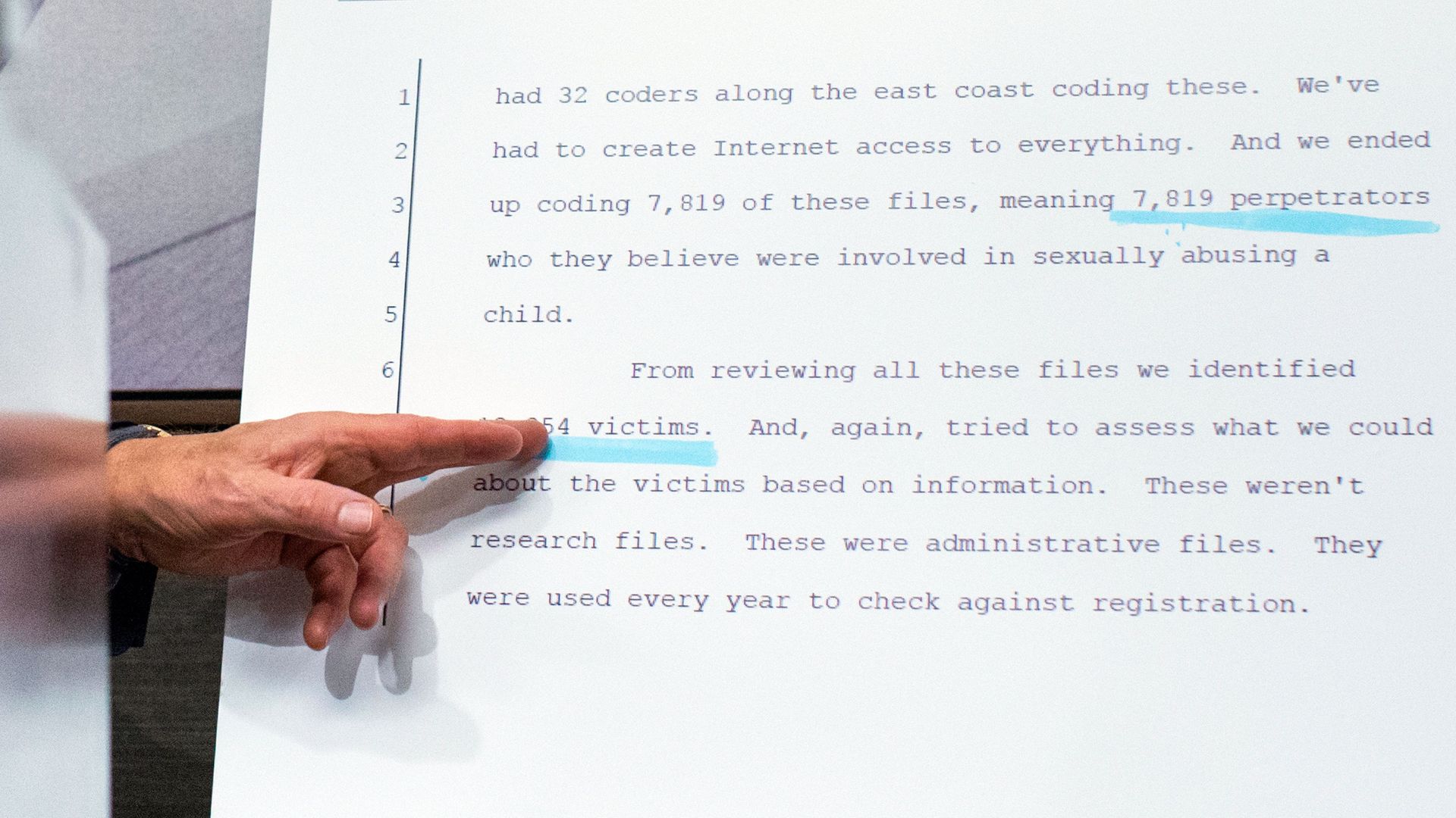 Lawyer pointing to lawsuit