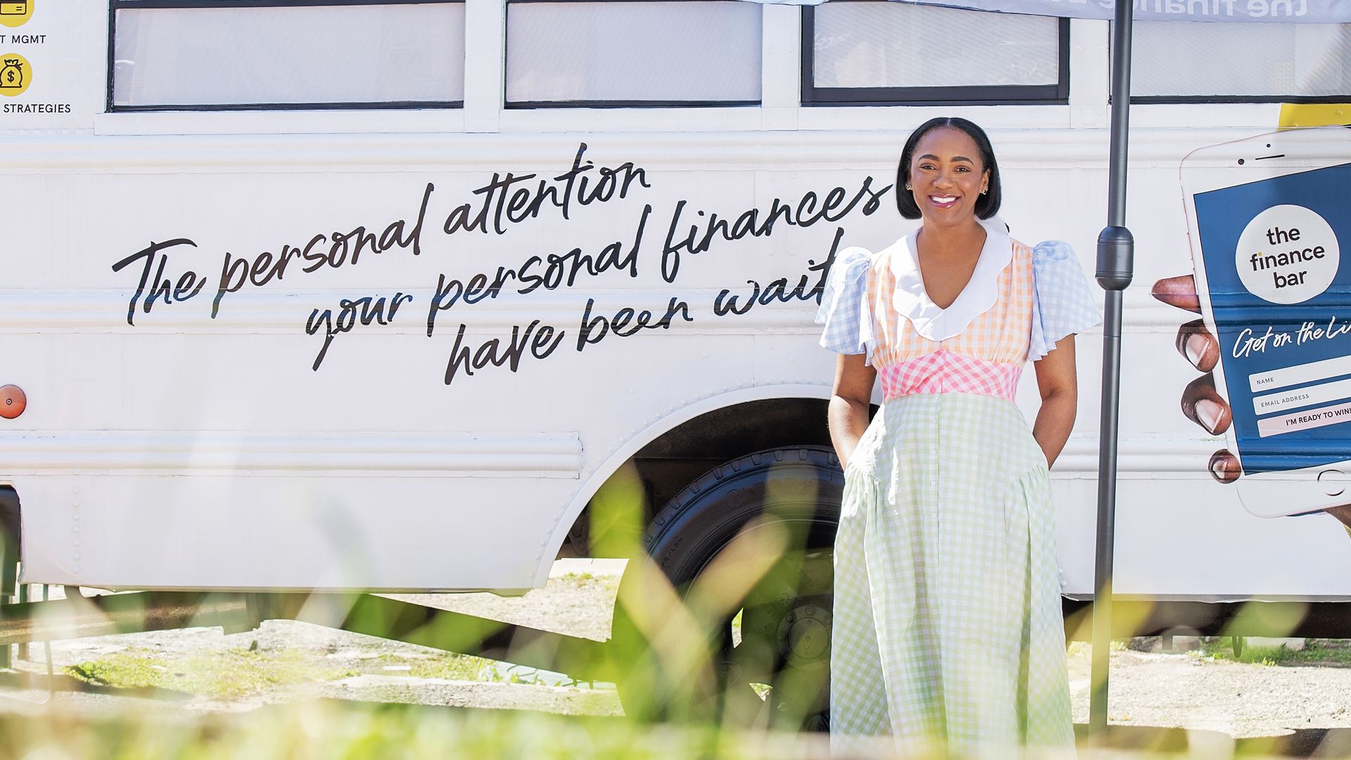 Marsha in front of her bus