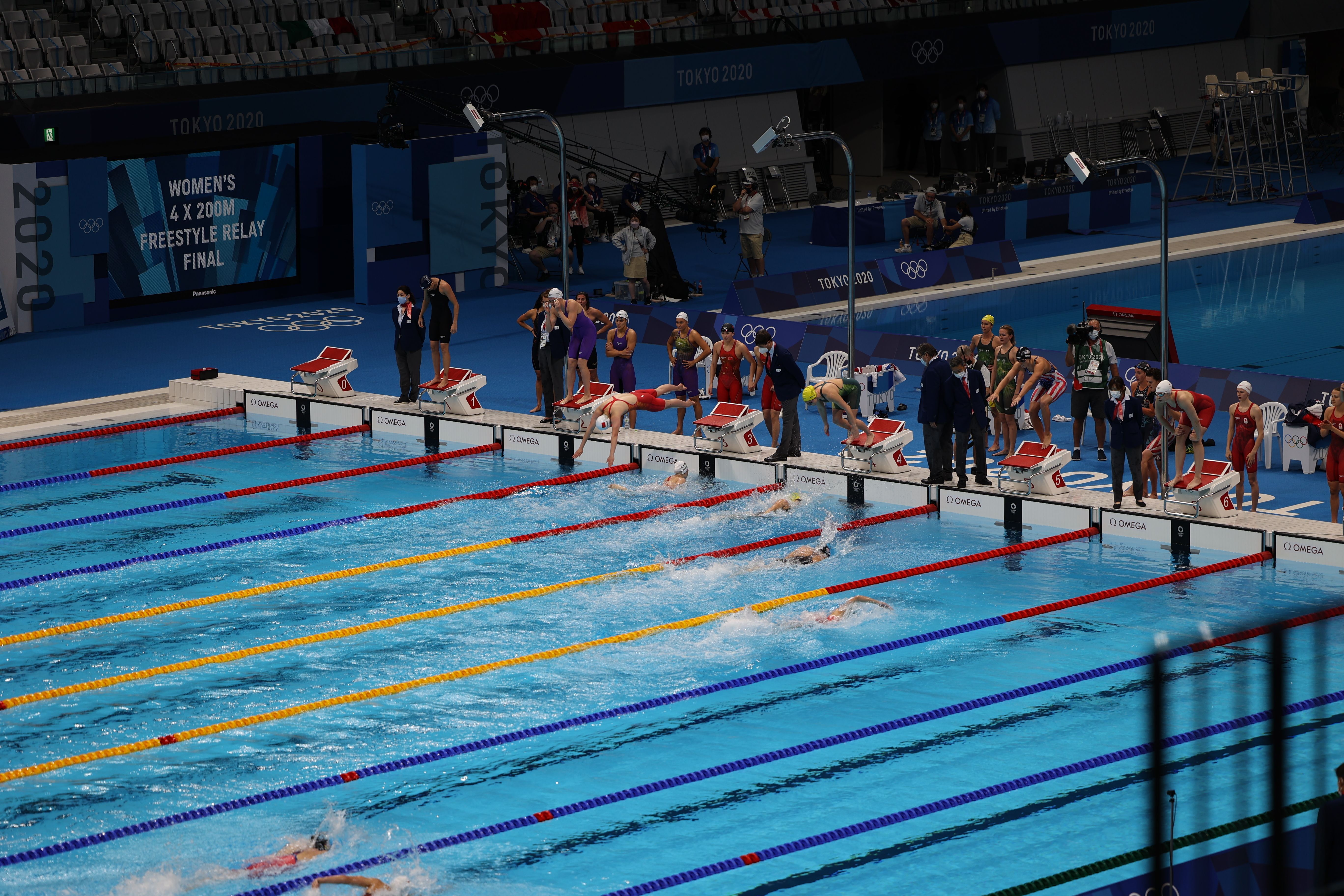 Scenes from the women's 4x200m freestyle relay final at the Tokyo Games July 29