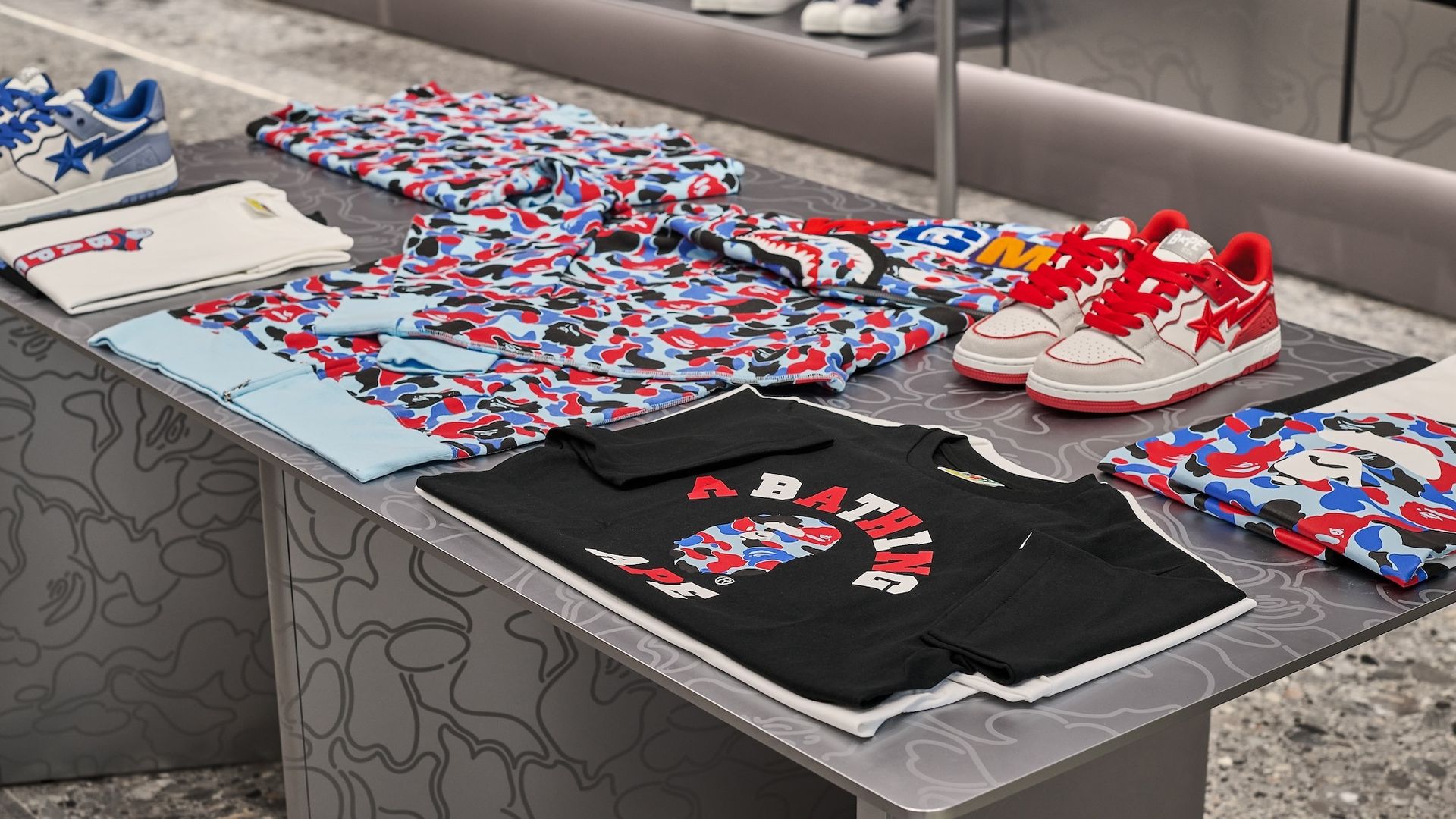 Photo of shirts and shoes folded on a table 