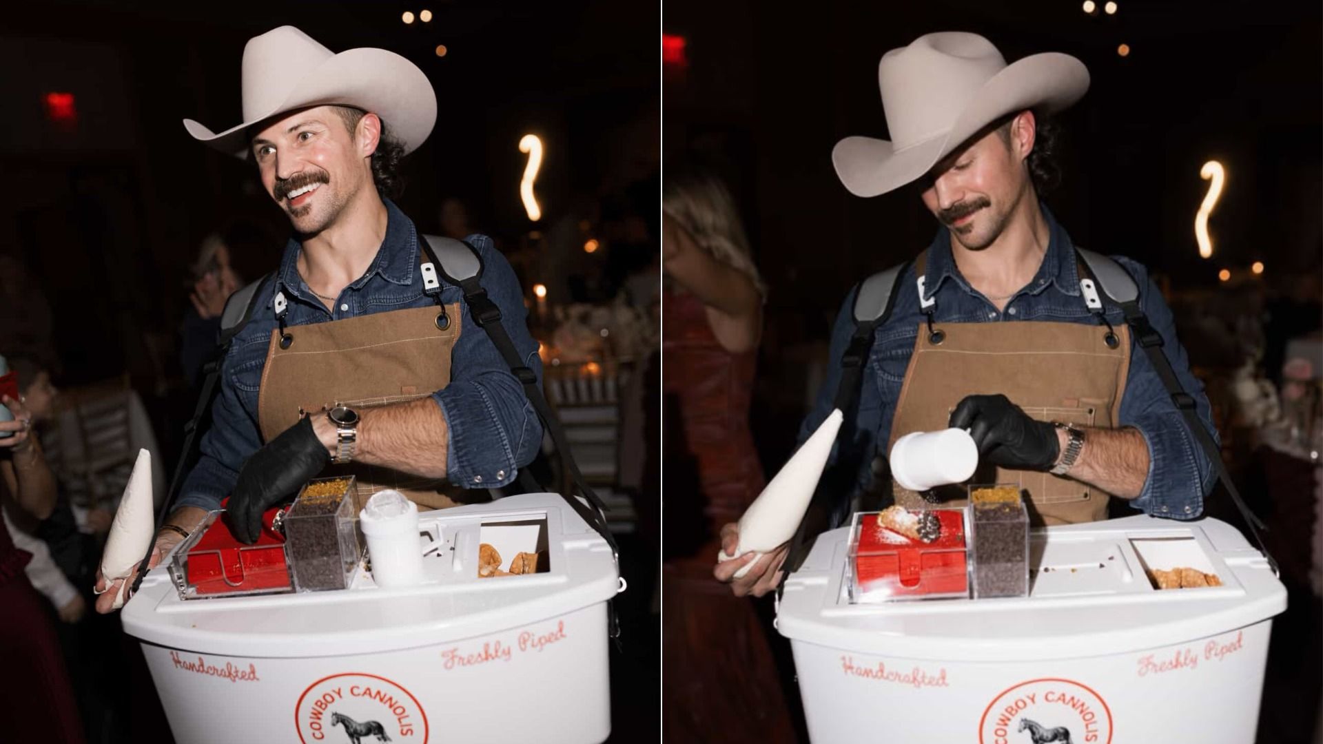 Smiling man in a white cowboy hat and denim shirt with brown apron serves cannoli from a white portable cart labeled "Cowboy Cannolis Handcrafted Freshly Piped" at a nighttime event.