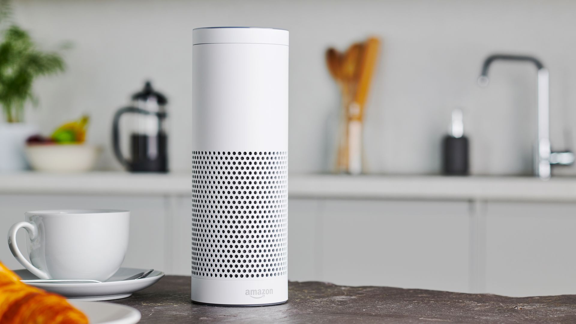 Photo of an Amazon Echo Plus speaker on a kitchen counter
