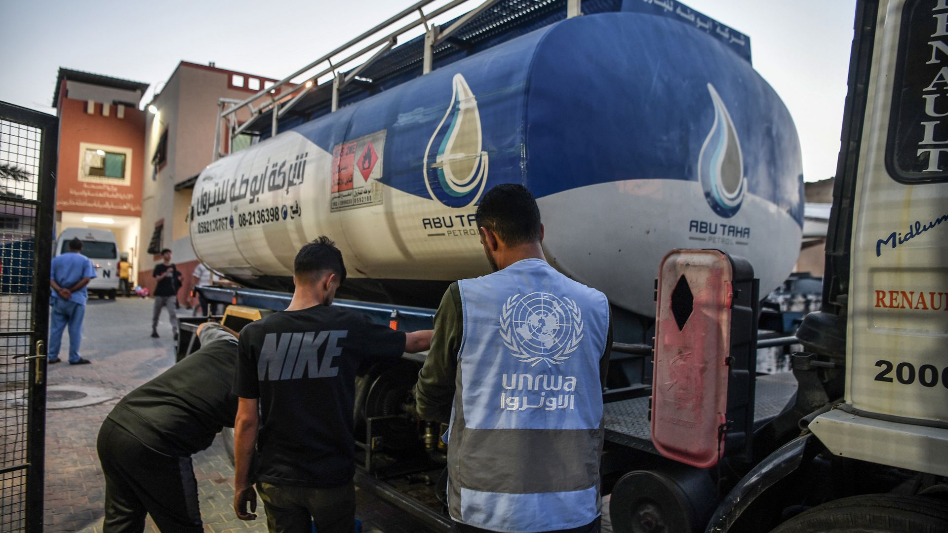 Officials of the United Nations (UN) Relief and Works Agency for Palestine Refugees in the Near East (UNRWA) bring fuel to solve fuel shortage at Al-Nasr Hospital in Khan Yunis, Gaza on November 10, 2023.