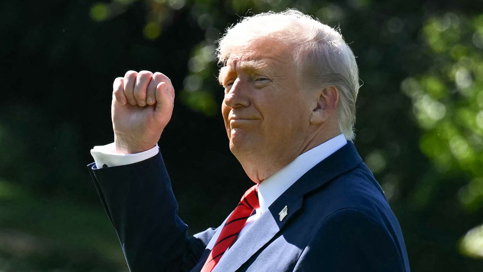 PresidentTrump gestures as he walks to Marine One on the South Lawn of the White House in Washington, D.C., on Oct. 10.