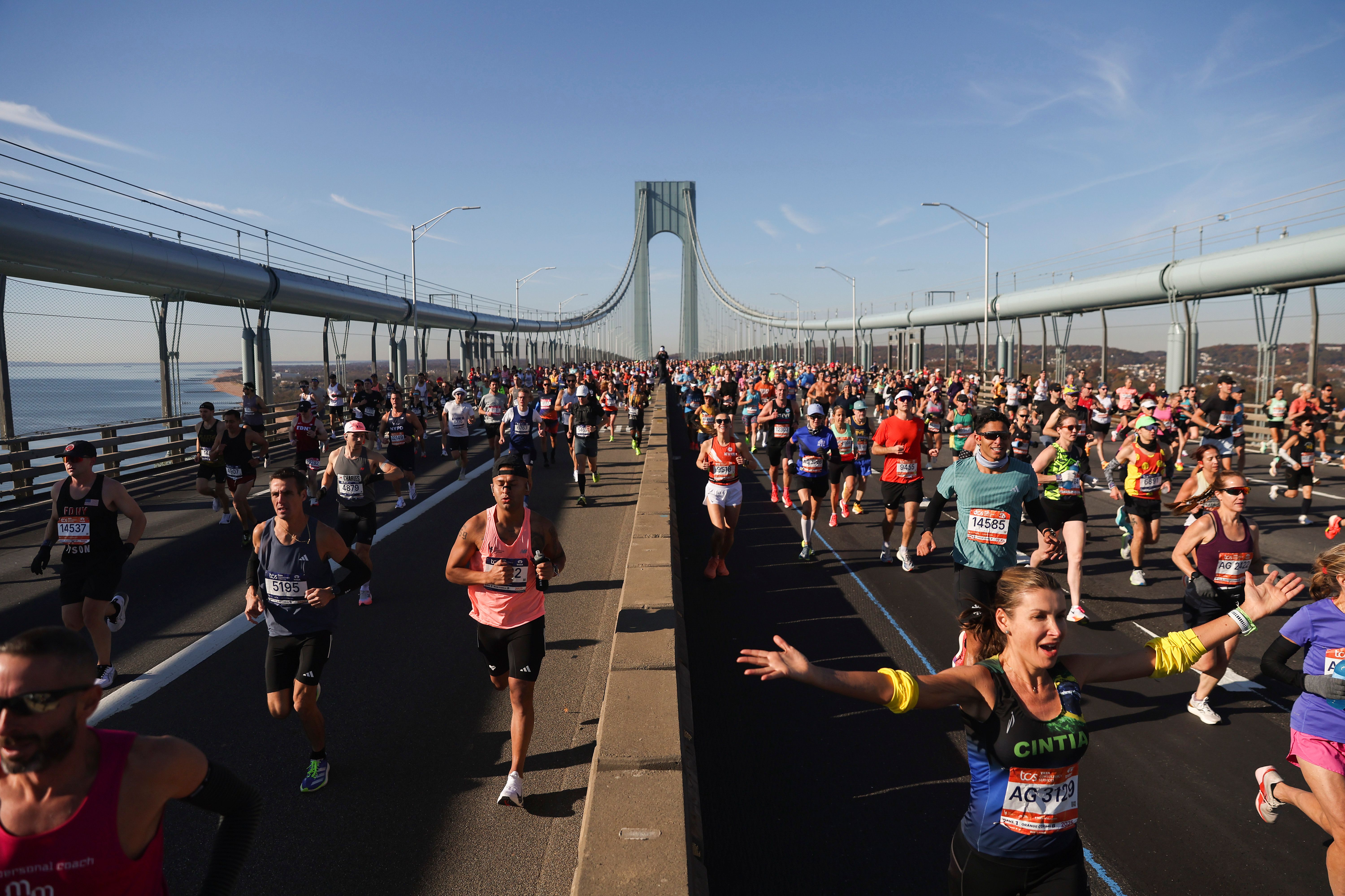 Runners make their way across the Verrazzano Narrows Bridge, which connects Staten Island and Brooklyn, at the start of the course.
