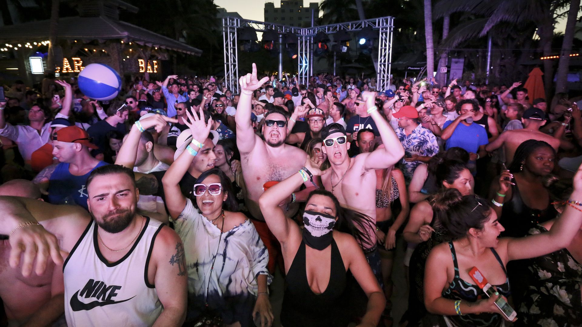 Guests dance to DJ music during the Chuckie & Friends Party hosted by 93.5FM Revolution Radio Miami