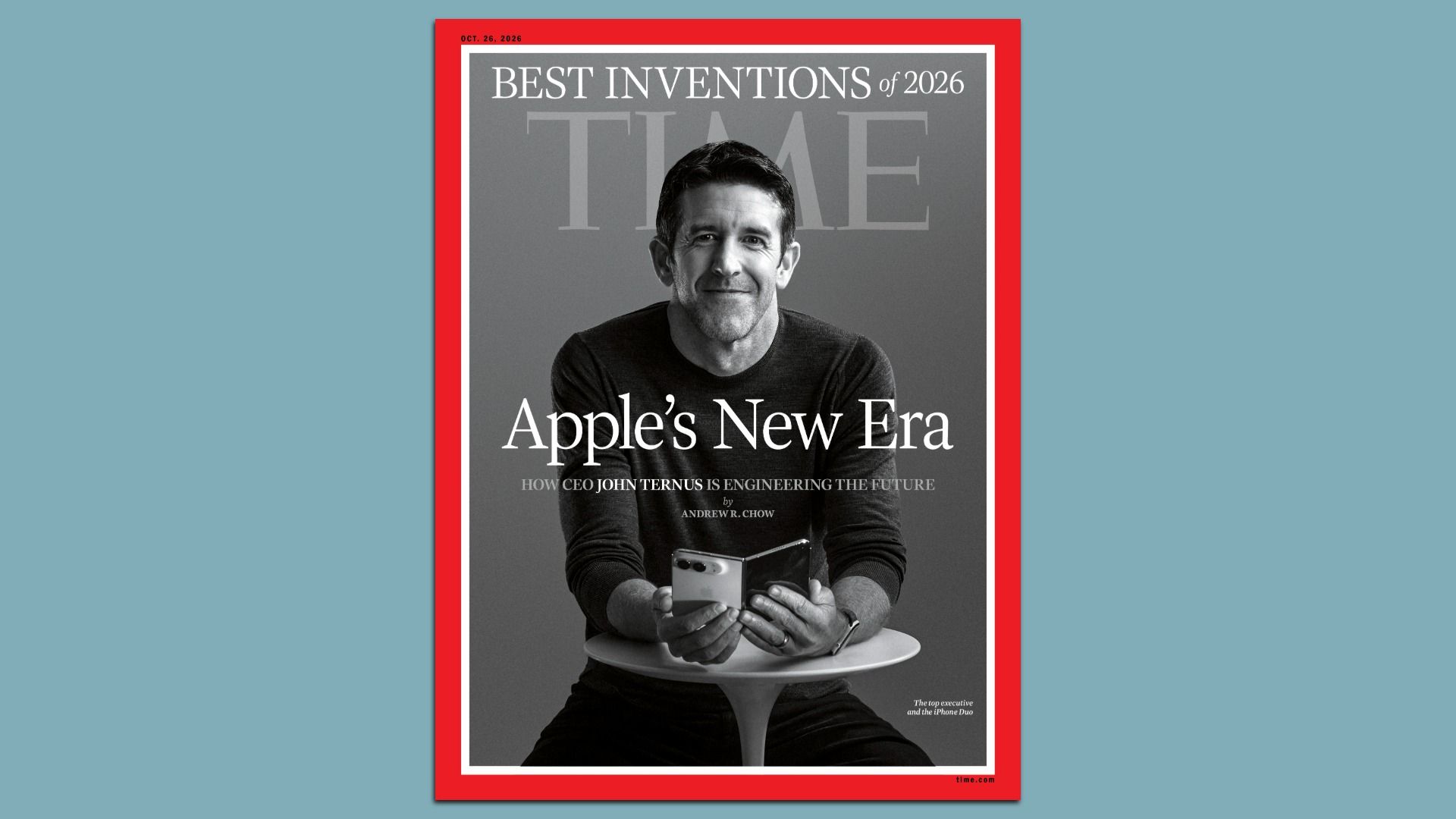 Grayscale Time magazine cover showing John Ternus smiling while holding an iPhone; headline "Apple's New Era" with "Best Inventions of 2026" at top; red border around the cover on a blue background.