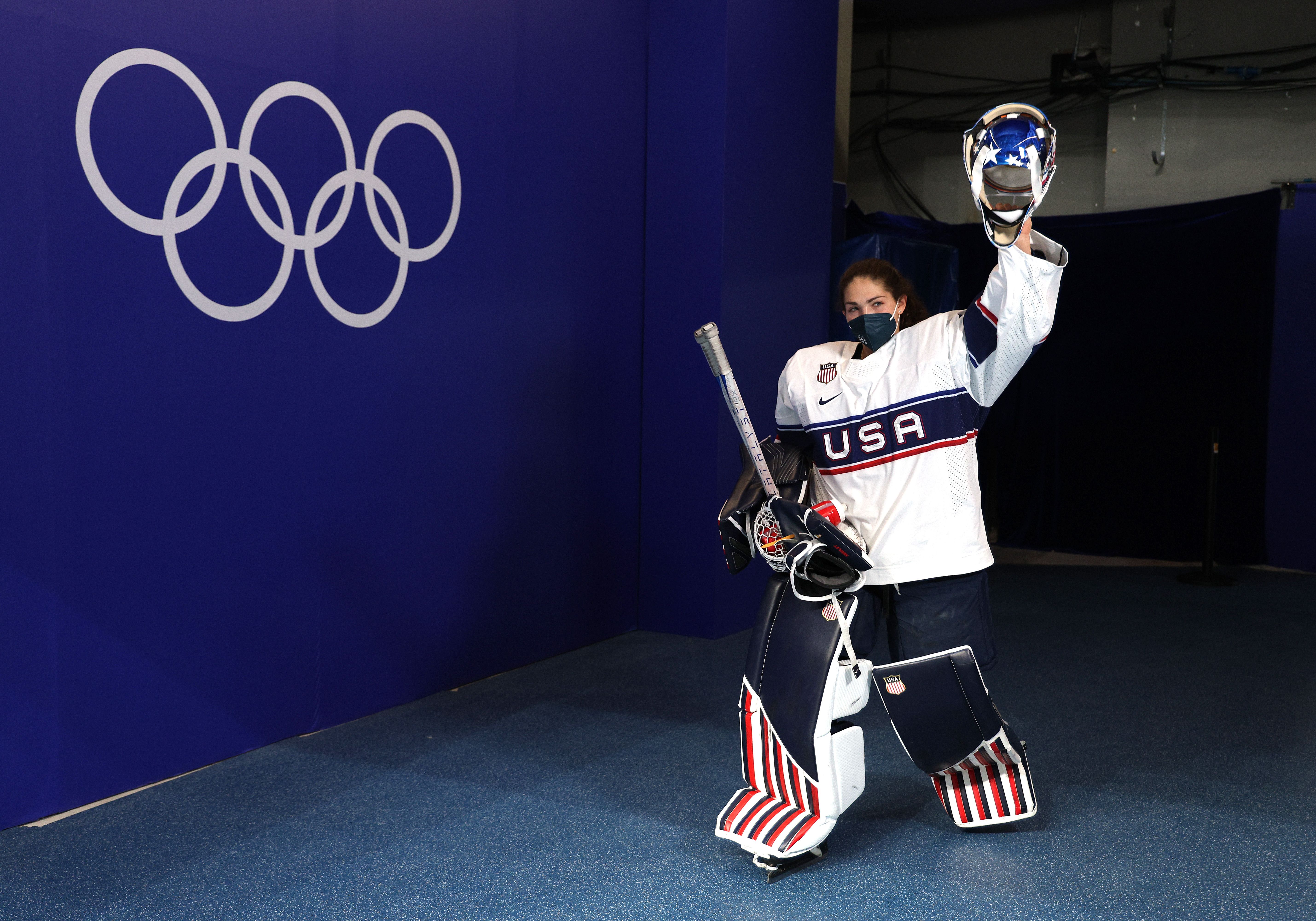 Nicole Hensley #29 of Team United States waves as she makes her way to the ice in preparation for the 2022 Beijing Winter Olympics 