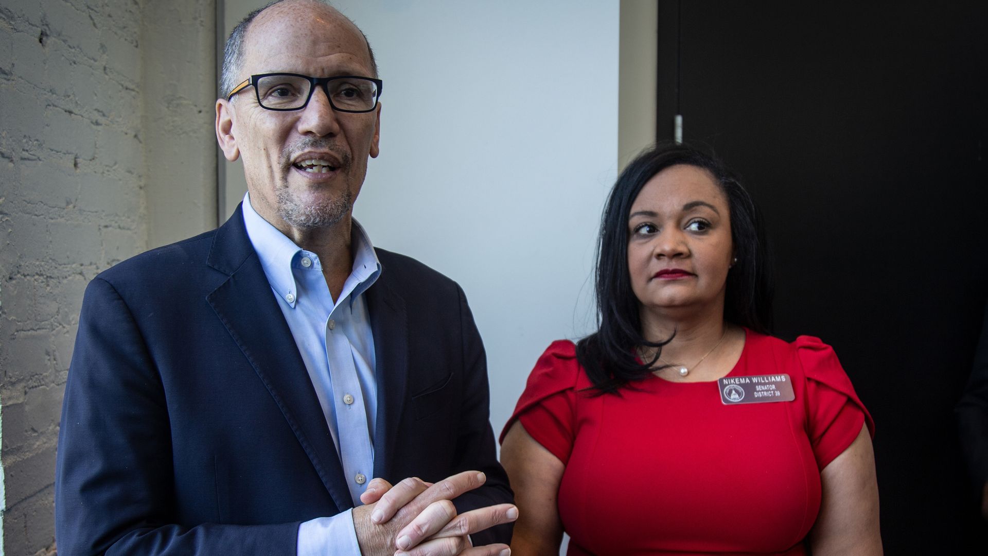 Nikema Williams and Tom Perez