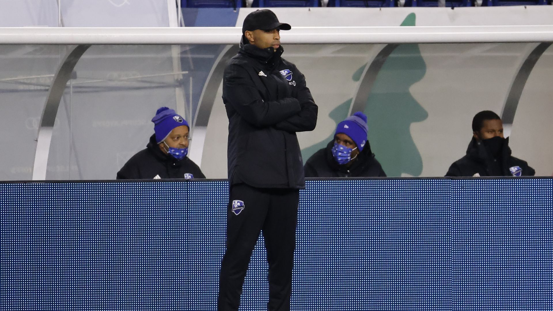 thierry henry on sideline of montreal mls game as coach