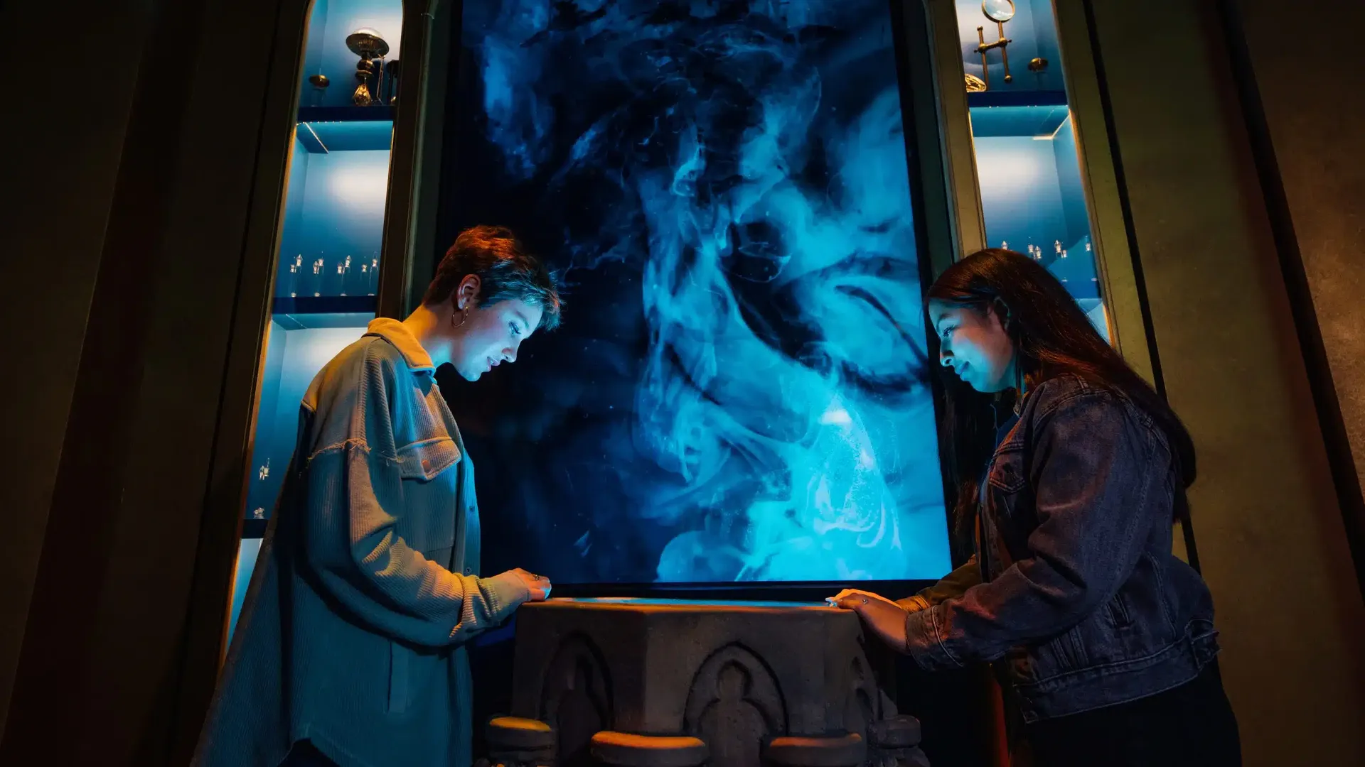 Two visitors at the Harry Potter: The Exhibition. 