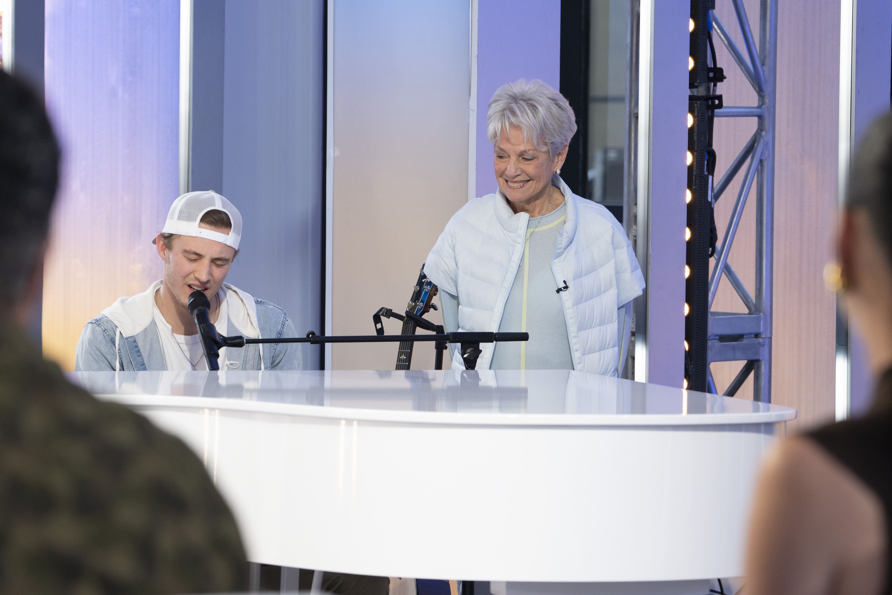 Blake Proehl performing on "American Idol" next to his Nana.