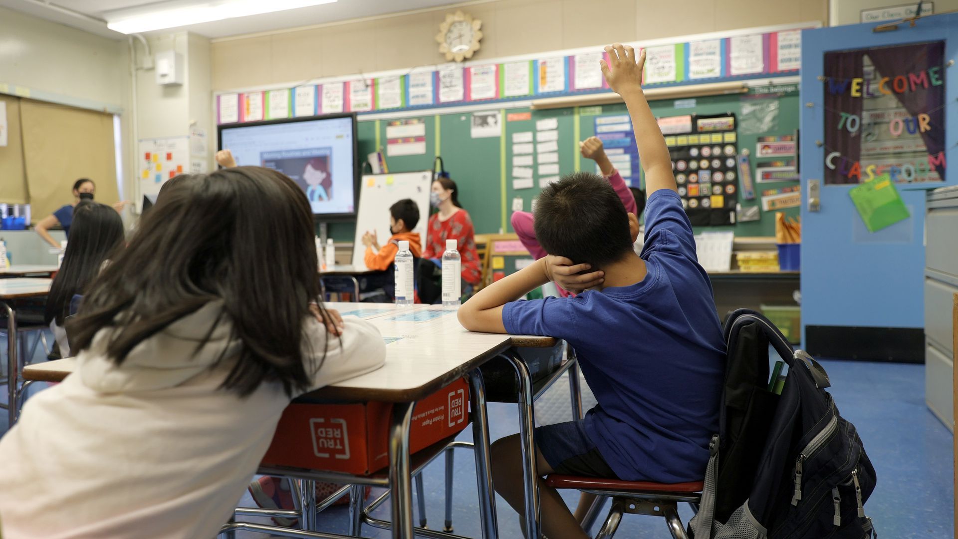 Masked teachers and students in a NYC school. 