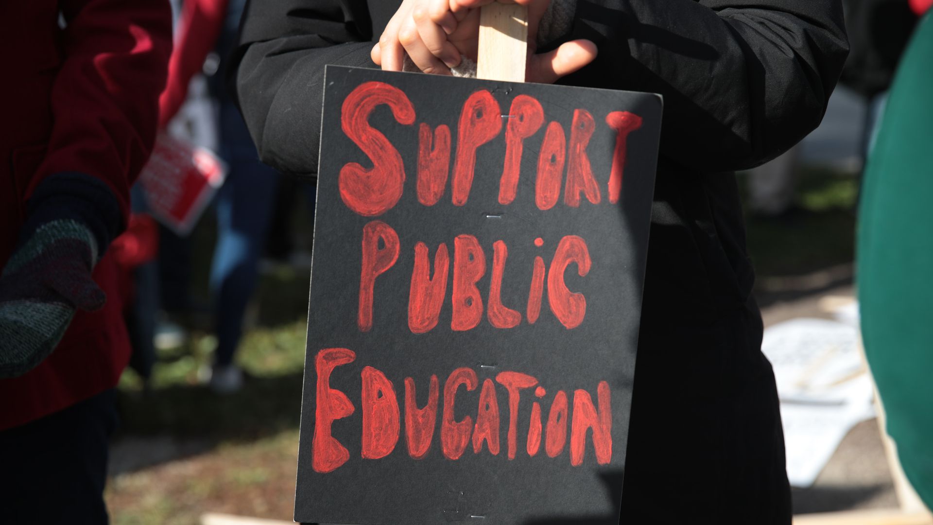 Chicago public school teachers and their supporters picket