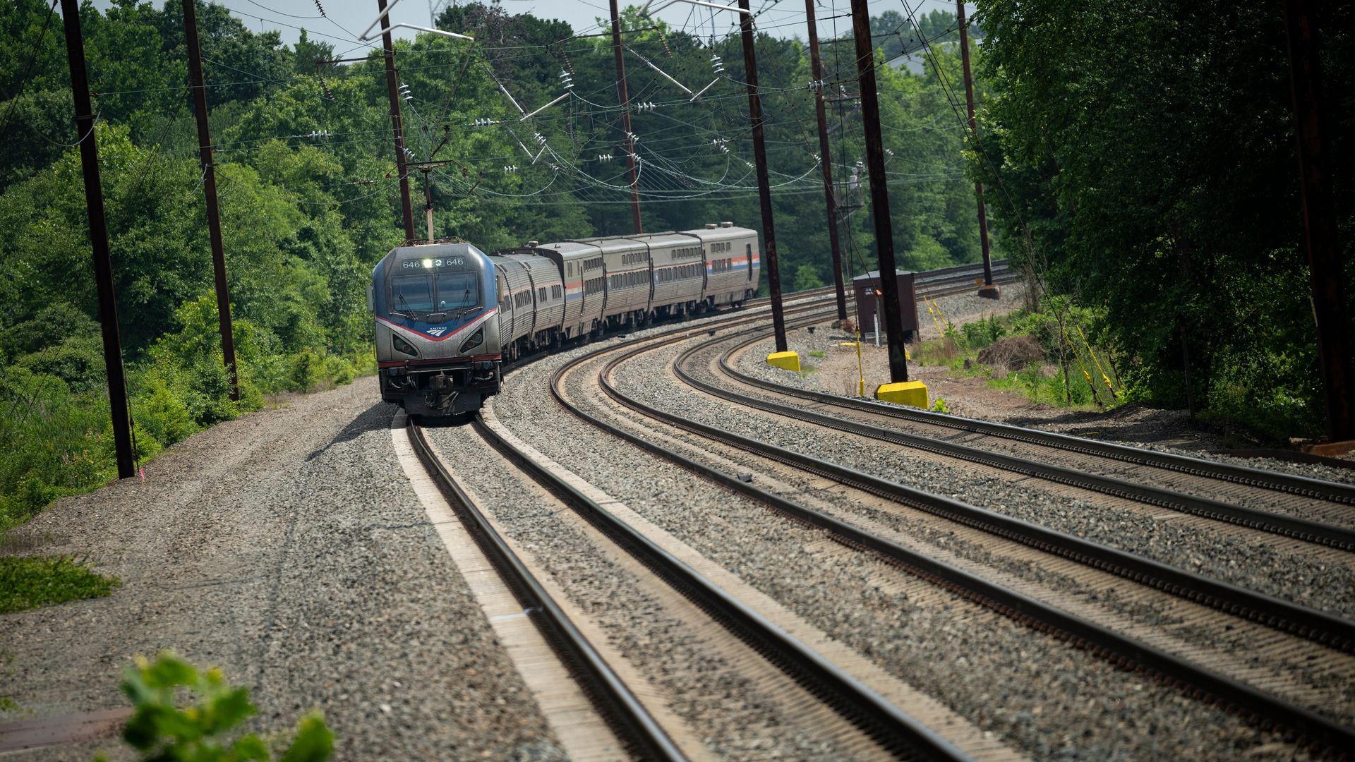 An Amtrak train  arrives at BWI Marshall Rail Station in Linthicum Heights, Maryland, US, on Monday, June 17, 2024. While summer doesn't officially start until Thursday, across the US more than 120 daily high temperature records may be broken or tied, with the majority of them in the Midwest, Mid-At