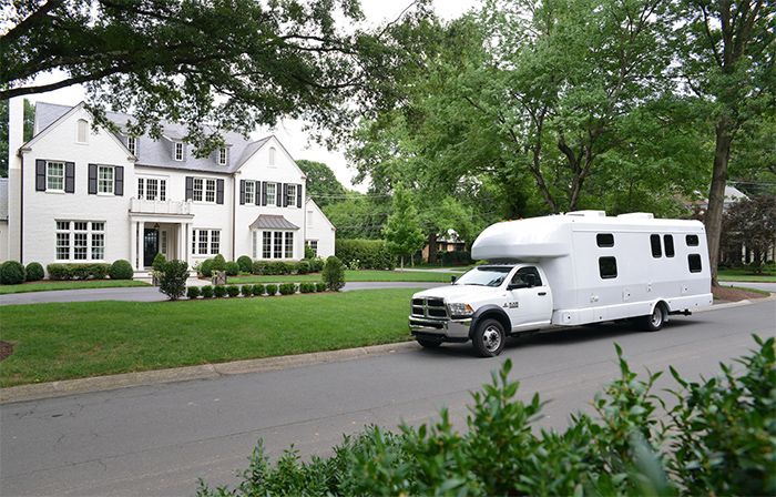 jitterbug-bus-outside-of-home-charlotte-travel