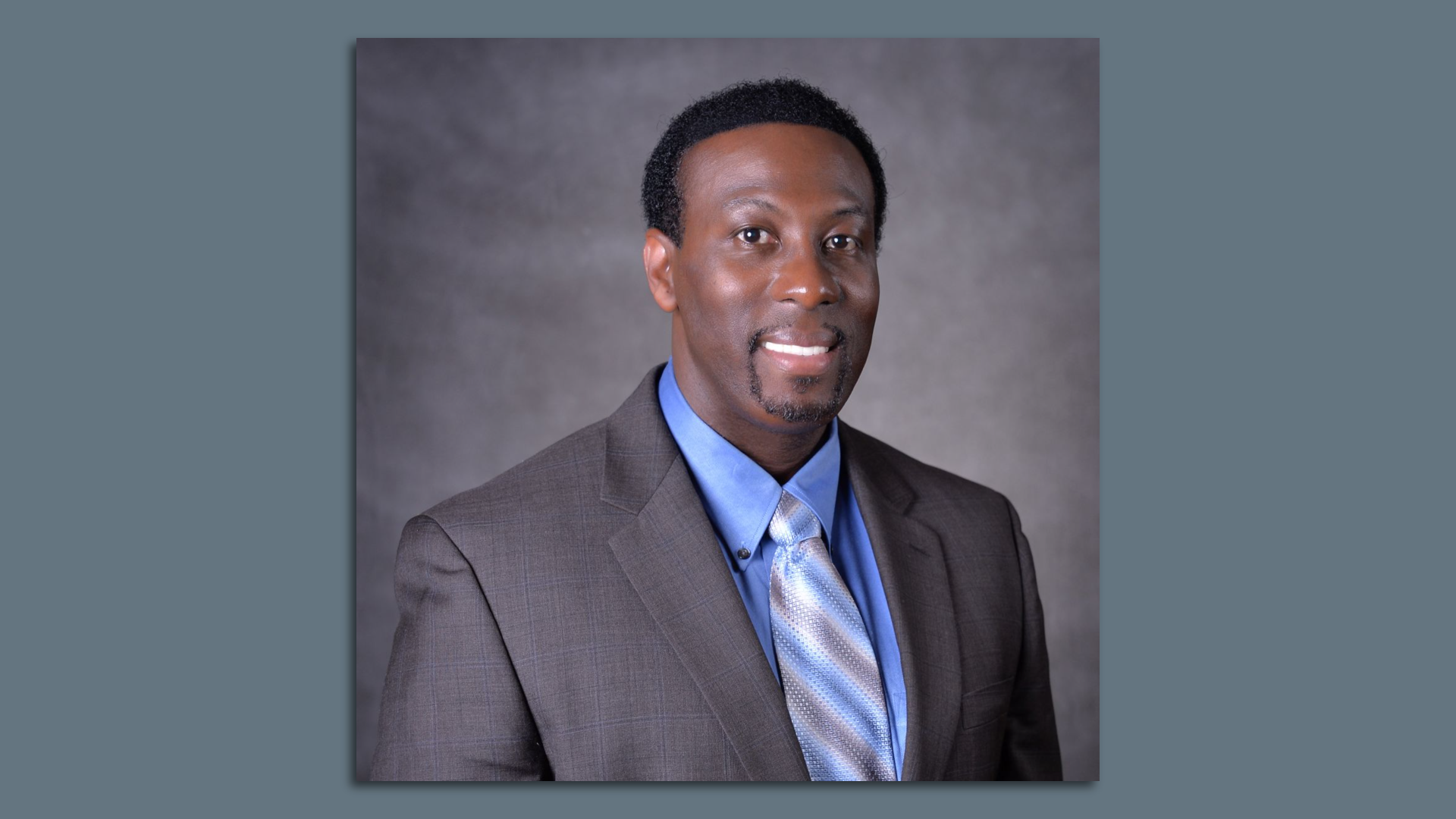 A headshot of Timothy Gadson III.