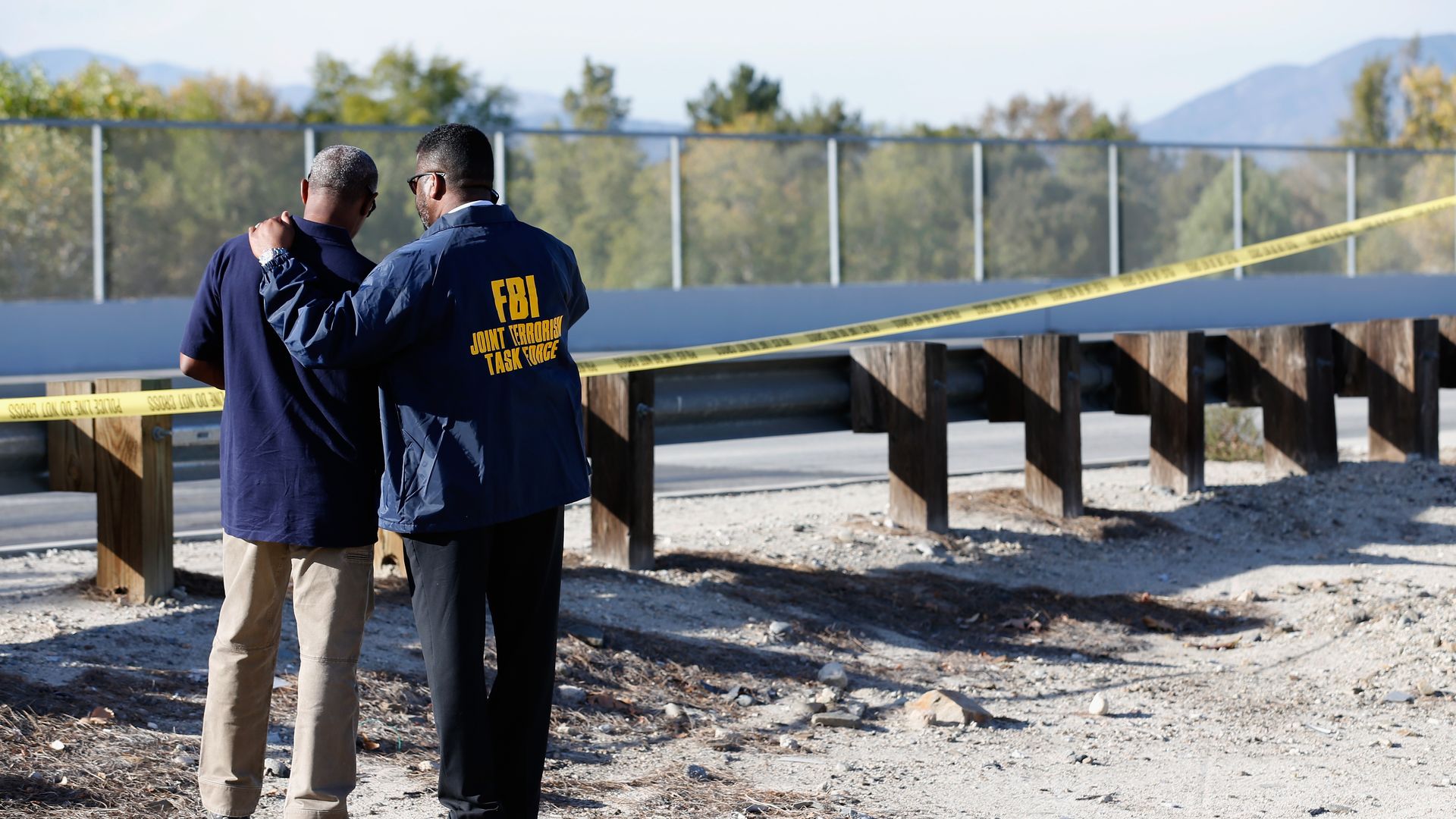  Members of the FBI Joint Terrorism Task Force stand outside of a press conference regarding the shooting that occurred at the Inland Regional Center 